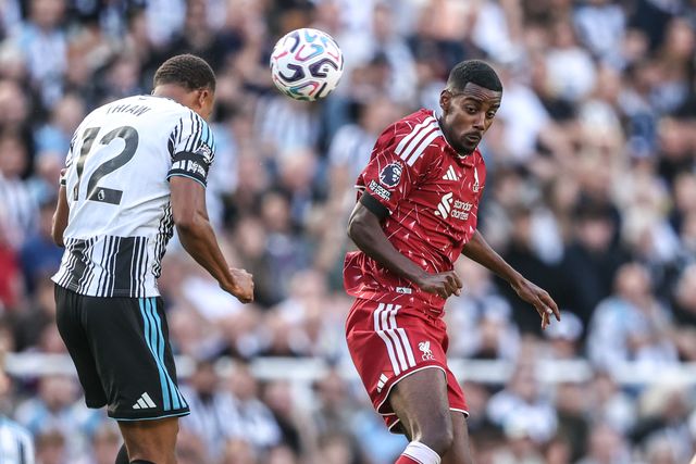 Malick Thiaw of Newcastle United heads clear of Alexander Isak of Liverpool during the Premier League match Newcastle Untied vs Liverpool at St. James's Park, Newcastle, United Kingdom on 23 August 2026

(Photo by Alfie Cosgrove/News Images)