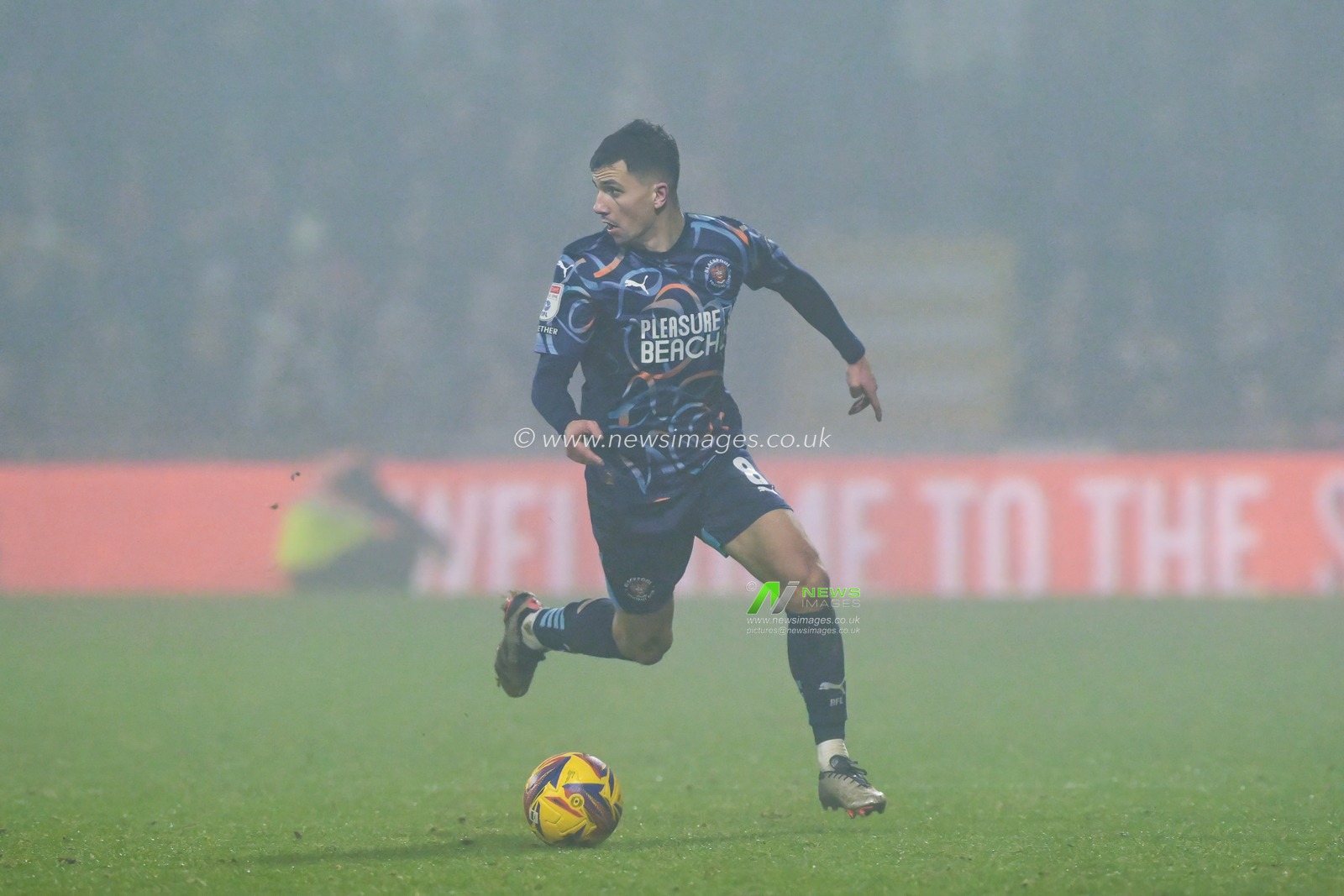 Albie Morgan of Blackpool makes a break with the ball during the Sky Bet League 1 match Wrexham vs Blackpool at SToK Cae Ras, Wrexham, United Kingdom, 26th December 2024

(Photo by Craig Thomas/News Images)