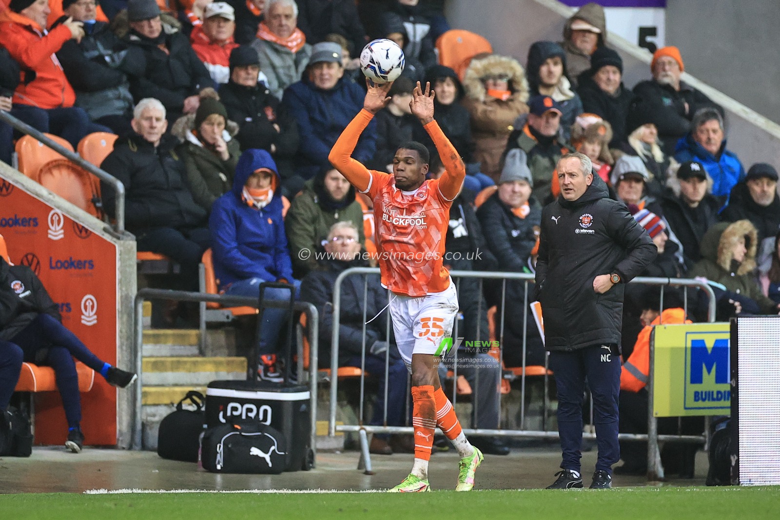 Dujon Sterling #35 of Blackpool takes a throw-in