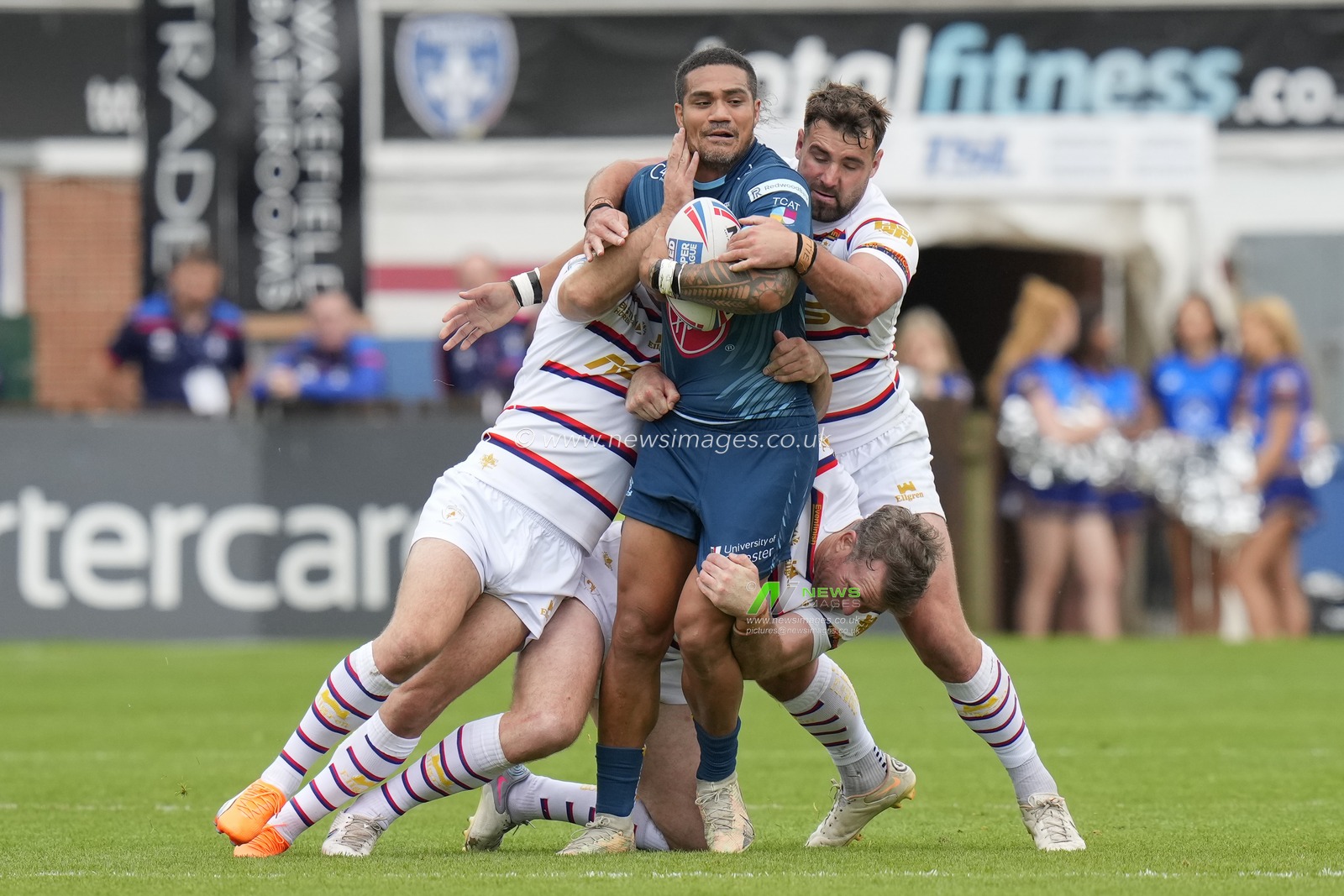 Josh Bowden #15 of Wakefield Trinity tackles Pete Mataâ€™utia #3 of Warrington Wolves during the Betfred Super League Round 20 match Wakefield Trinity vs Warrington Wolves at The Be Well Support Stadium, Wakefield, United Kingdom, 30th July 2023

(Photo by Steve Flynn/News Images)