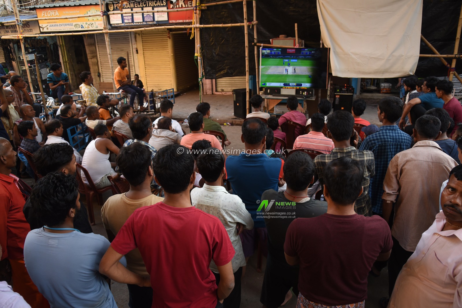 Indian fans enjoy live telecast of Champions Trophy Final match between India and New Zealand on LED TV, on March 9,2025 in Kolkata, India. Pictures by Debajyoti Chakraborty.(Photo: Debajyoti Chakraborty/News Images)