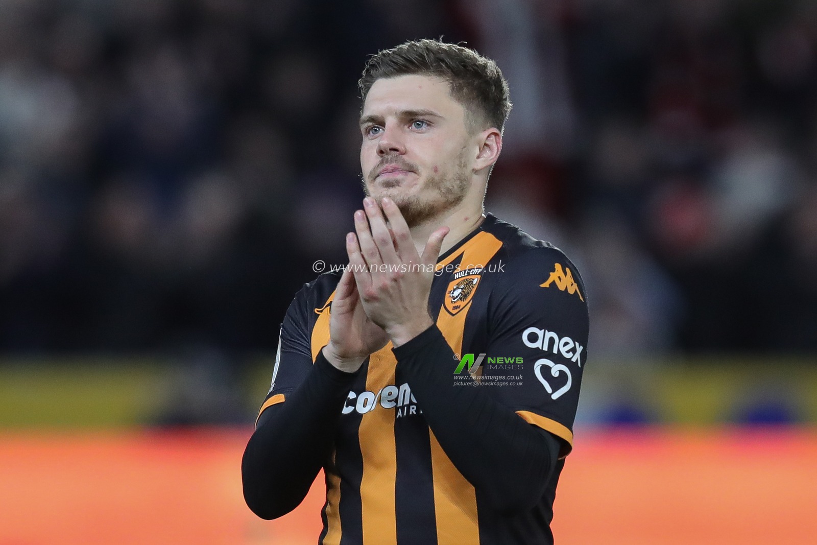Regan Slater #27 of Hull City claps his hands and applauds the supporters at full-time after the Sky Bet Championship match Hull City vs Sunderland at MKM Stadium, Hull, United Kingdom, 26th December 2023

(Photo by James Heaton/News Images)