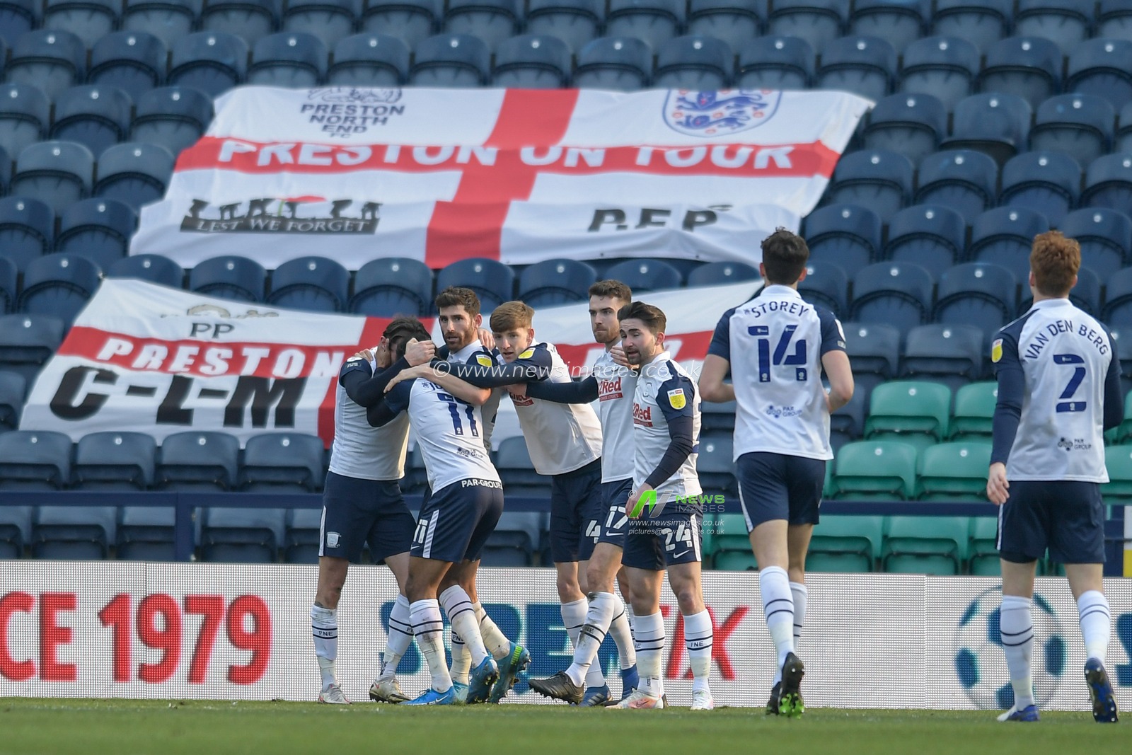 Daniel Johnson #11 of Preston North End celebrates scoring a goal with his team mates to make it 1-1