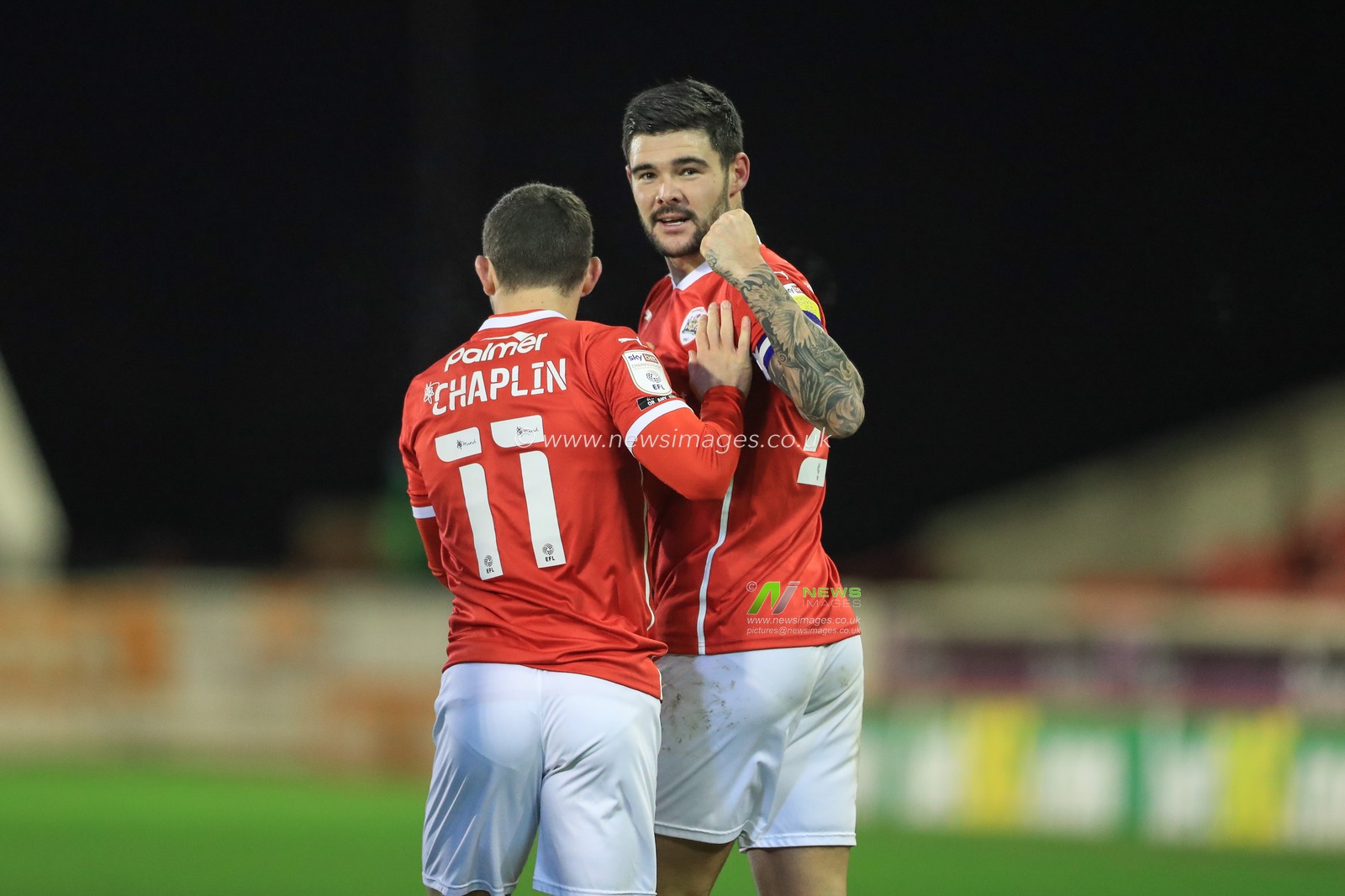 Alex Mowatt #27 of Barnsley celebrates his goal to make it 1-1 with Conor Chaplin #11 of Barnsley