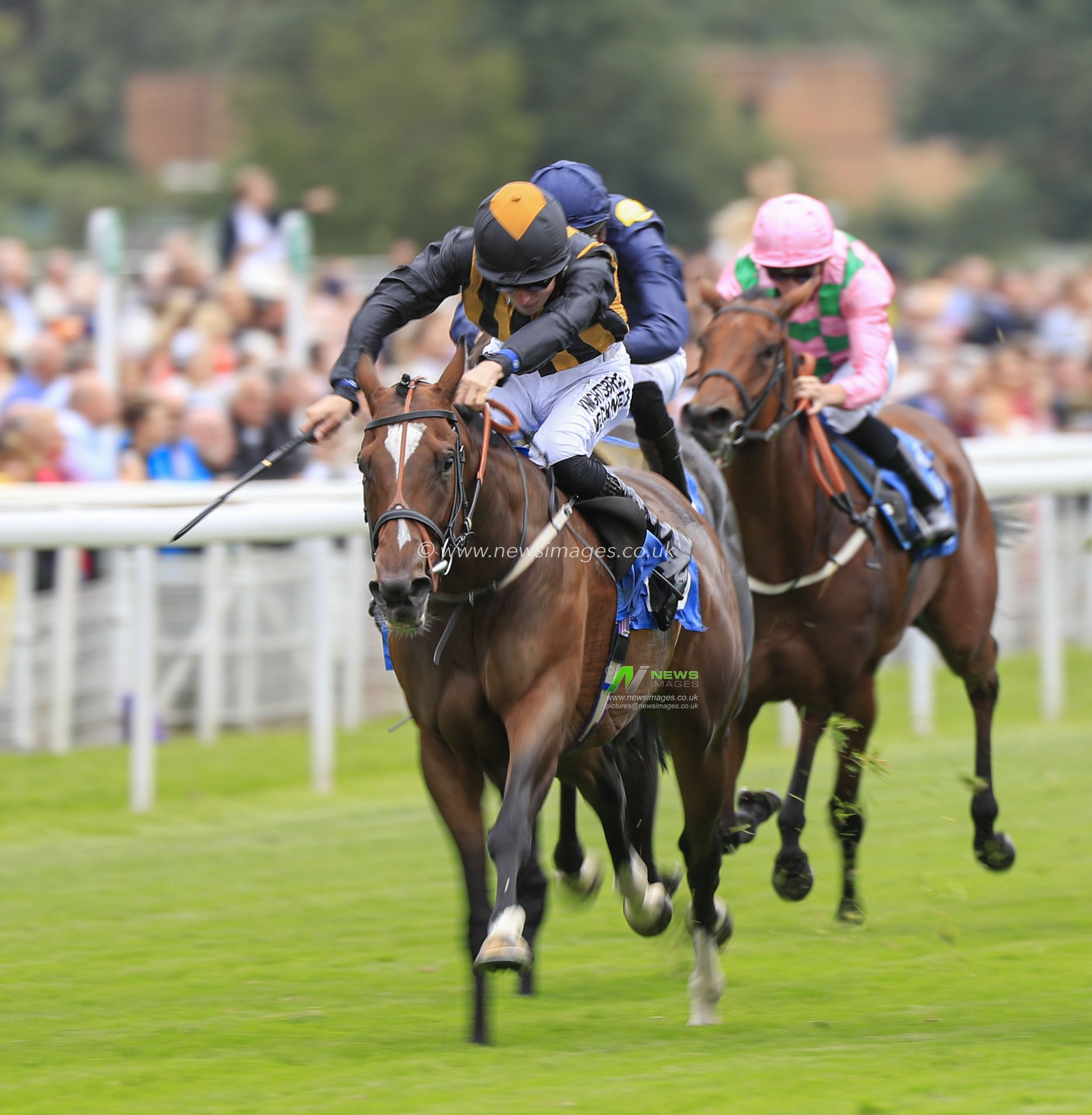 22nd August 2019 , York Racecourse, York, Great Britain; 2019 Darley Yorkshire Oaks/Ladies Day ; Excellent Times ridden by Phil Dennis (black & orange colours) runs on to win  The British Stallion Studs EBF Fillies Handicap

Credit Conor Molloy/News Images