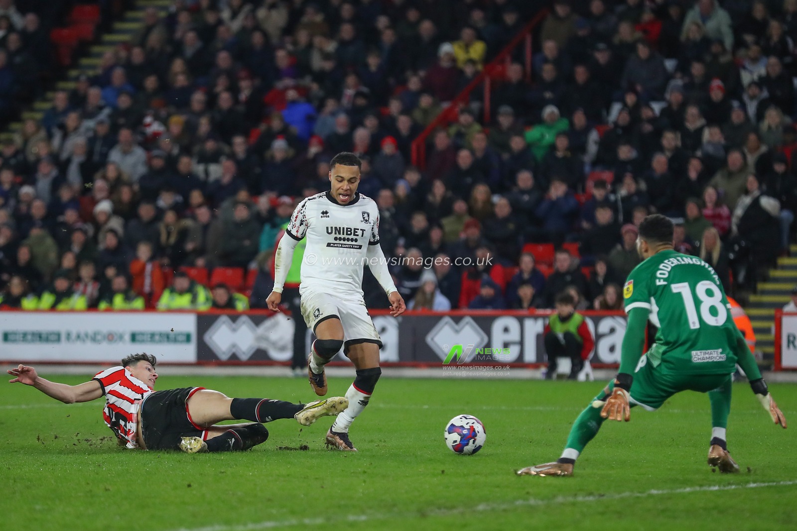 Anel AhmedhodÅ¾iÄ‡ #15 of Sheffield United tackles Cameron Archer #10 of Middlesbrough during the Sky Bet Championship match Sheffield United vs Middlesbrough at Bramall Lane, Sheffield, United Kingdom, 15th February 2023

(Photo by Gareth Evans/News Images)
