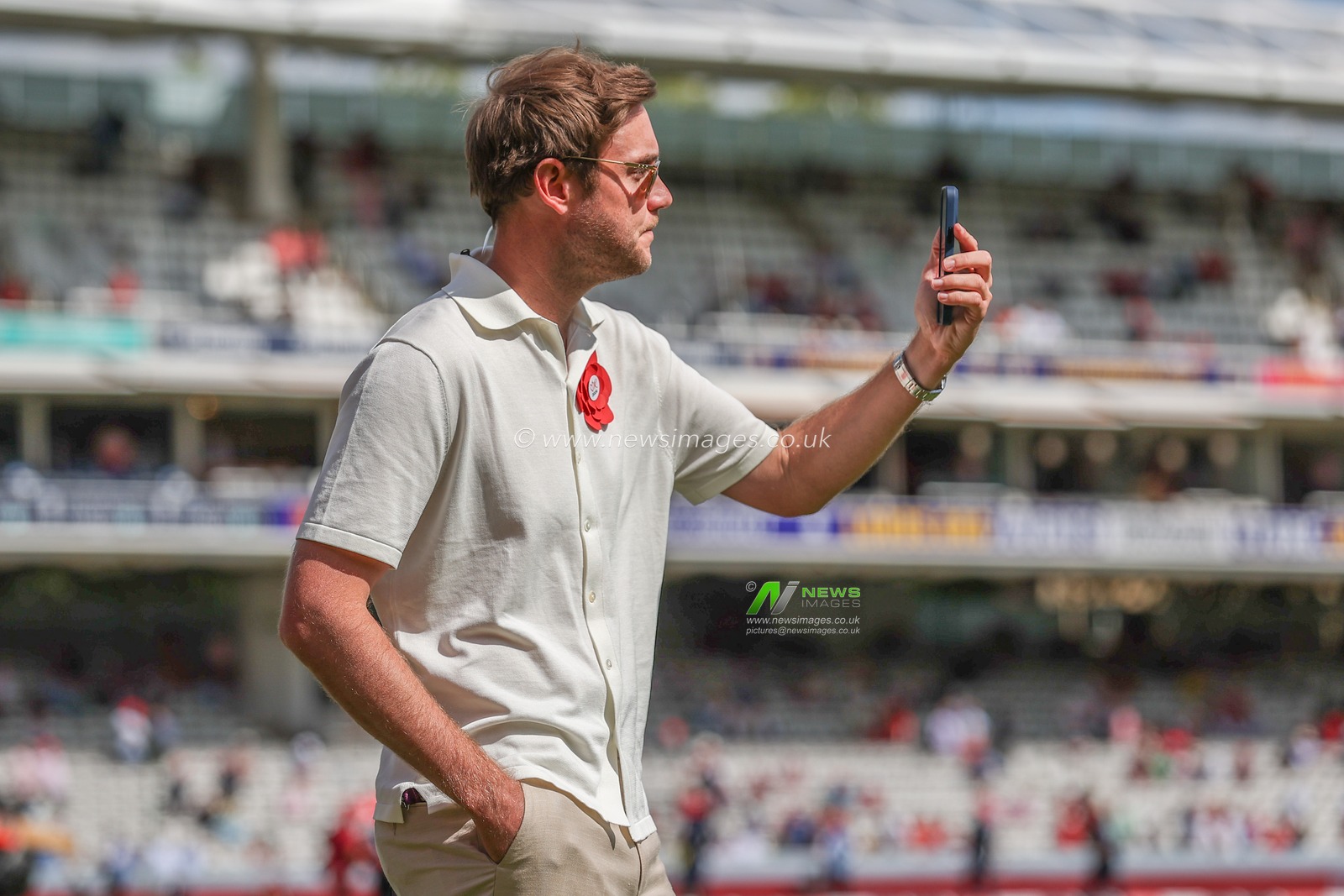 Former England player Stuart Broad speaks on his phone during the Rothesay Test Match Day Two England v West Indies at Lords, London, United Kingdom, 11th July 2024

(Photo by Mark Cosgrove/News Images)