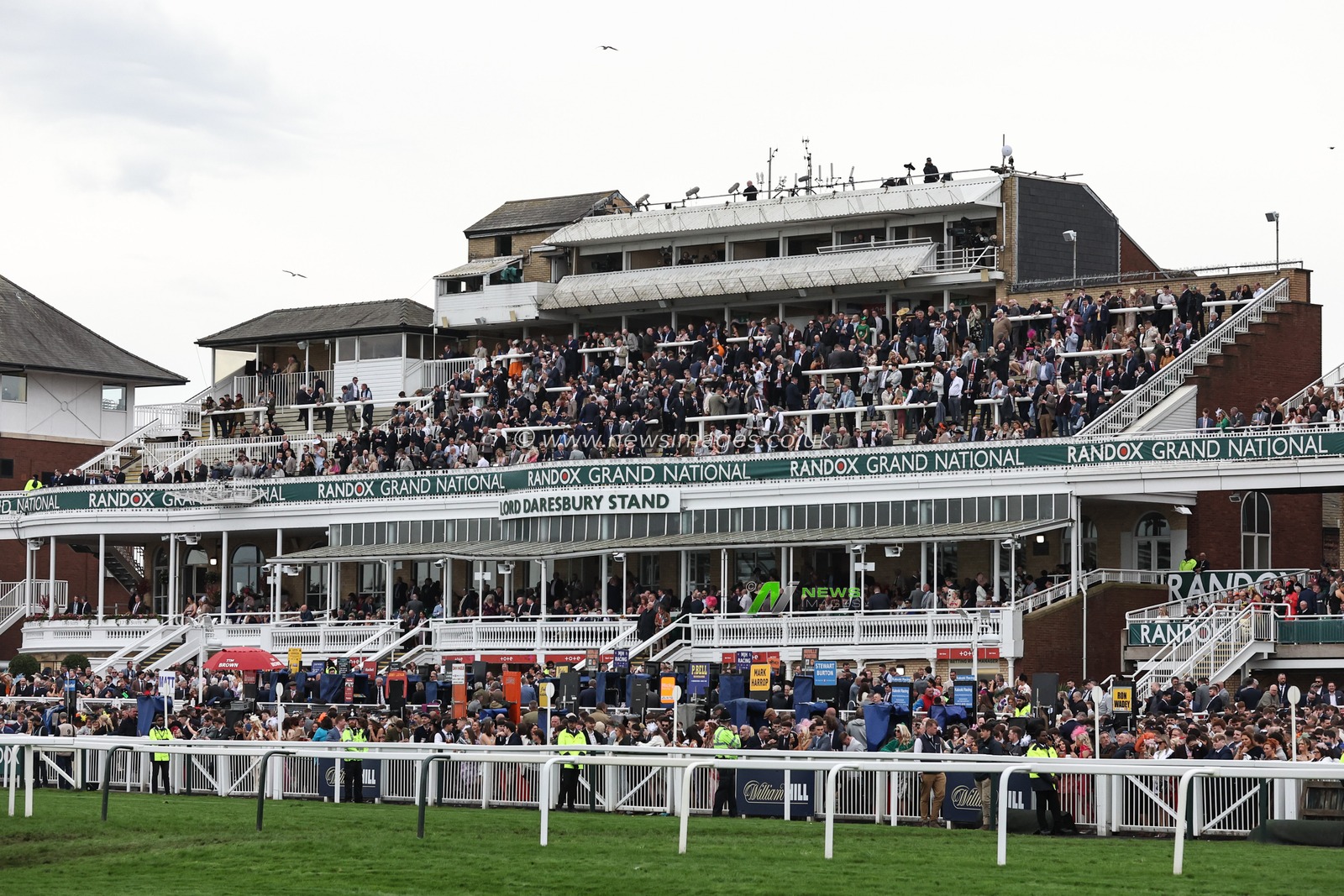 Racegoers enjoy the atmosphere during the The Randox Grand National 2024 Ladies Day at Aintree Racecourse, Liverpool, United Kingdom, 12th April 2024

(Photo by Mark Cosgrove/News Images)