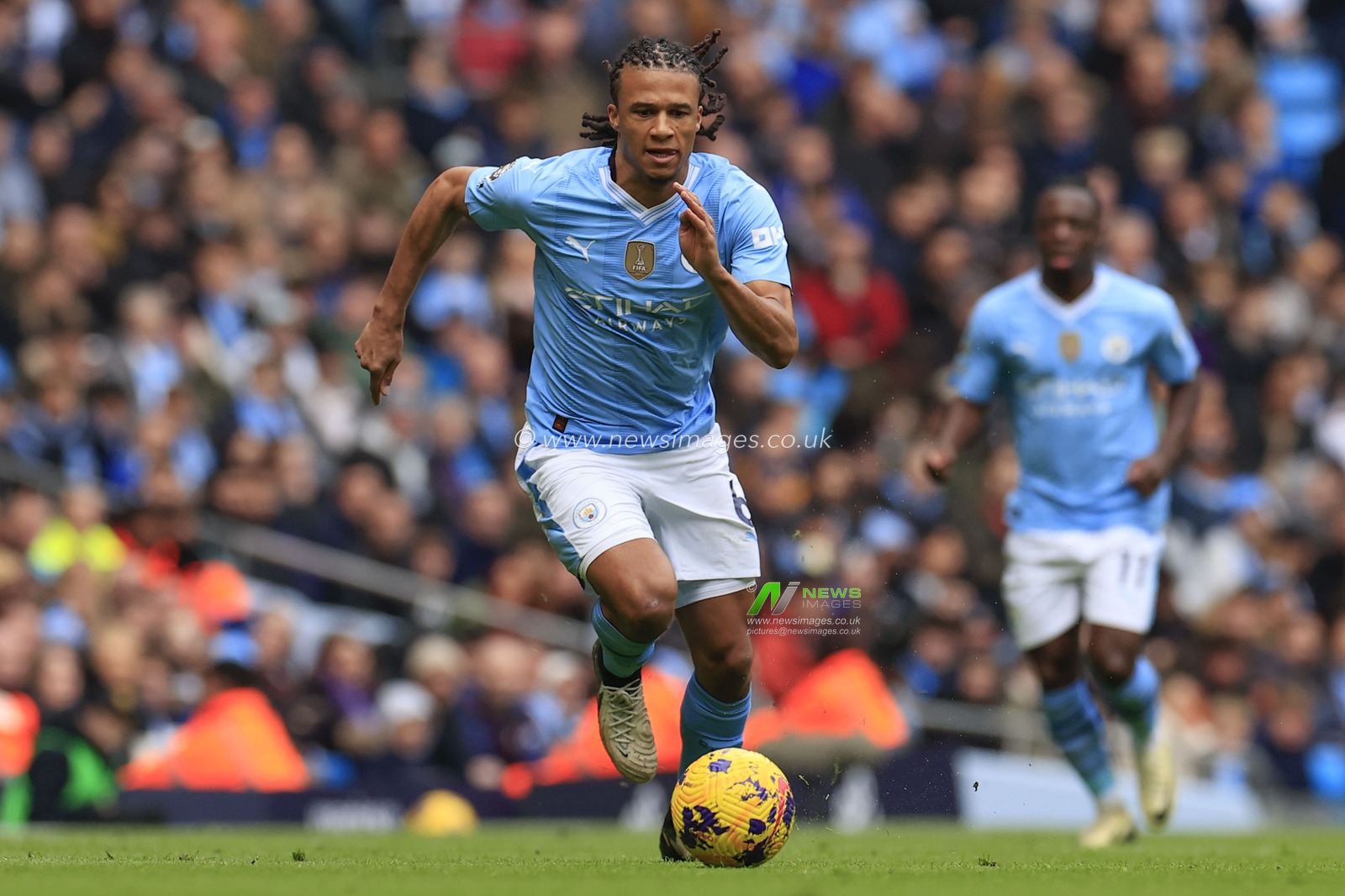 Nathan Ake of Manchester City runs with the ball during the Premier League match Manchester City vs Everton at Etihad Stadium, Manchester, United Kingdom, 10th February 2024

(Photo by Conor Molloy/News Images)