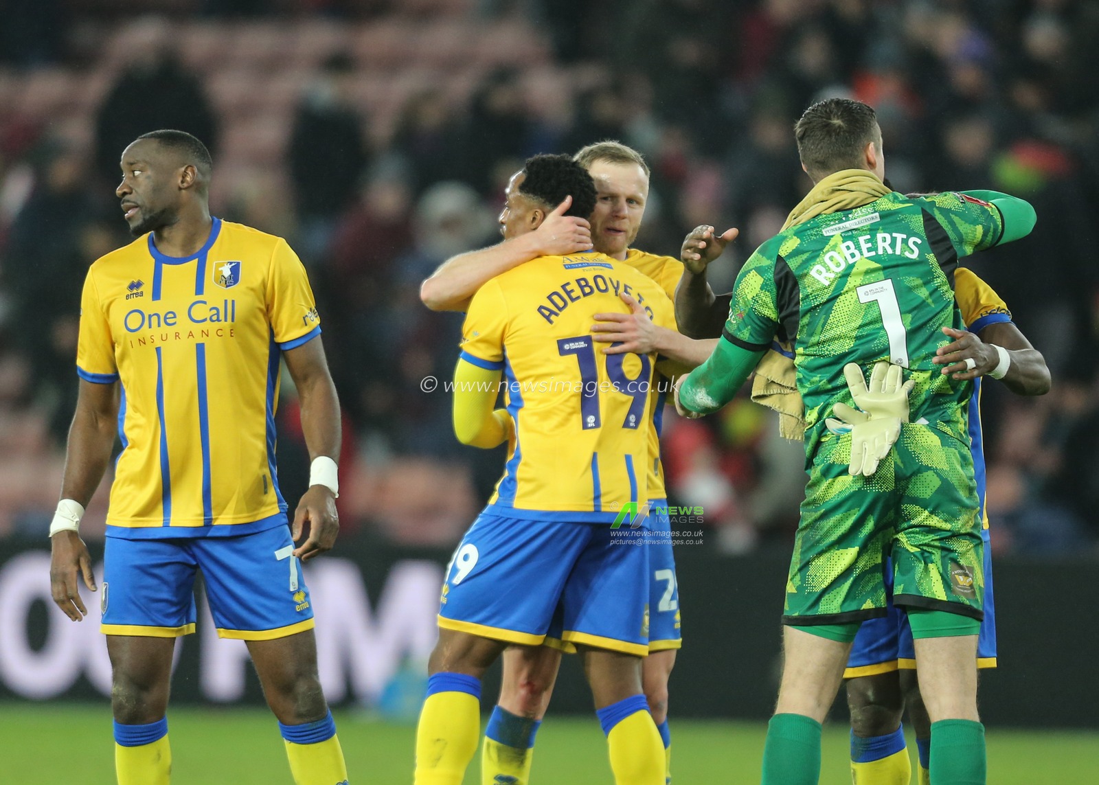 Mansfield Town players celebrate the win during the Emirates FA Cup Third Round match Sheffield United vs Mansfield Town at Bramall Lane, Sheffield, United Kingdom, 11th January 2026

(Photo by Richard Bierton/News Images)