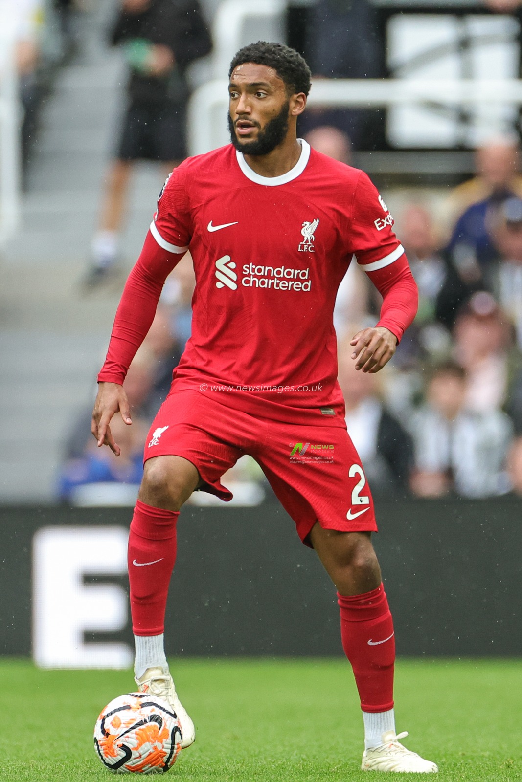 Joe Gomez #2 of Liverpool holds the ball during the Premier League match Newcastle United vs Liverpool at St. James's Park, Newcastle, United Kingdom, 27th August 2023

(Photo by Mark Cosgrove/News Images)