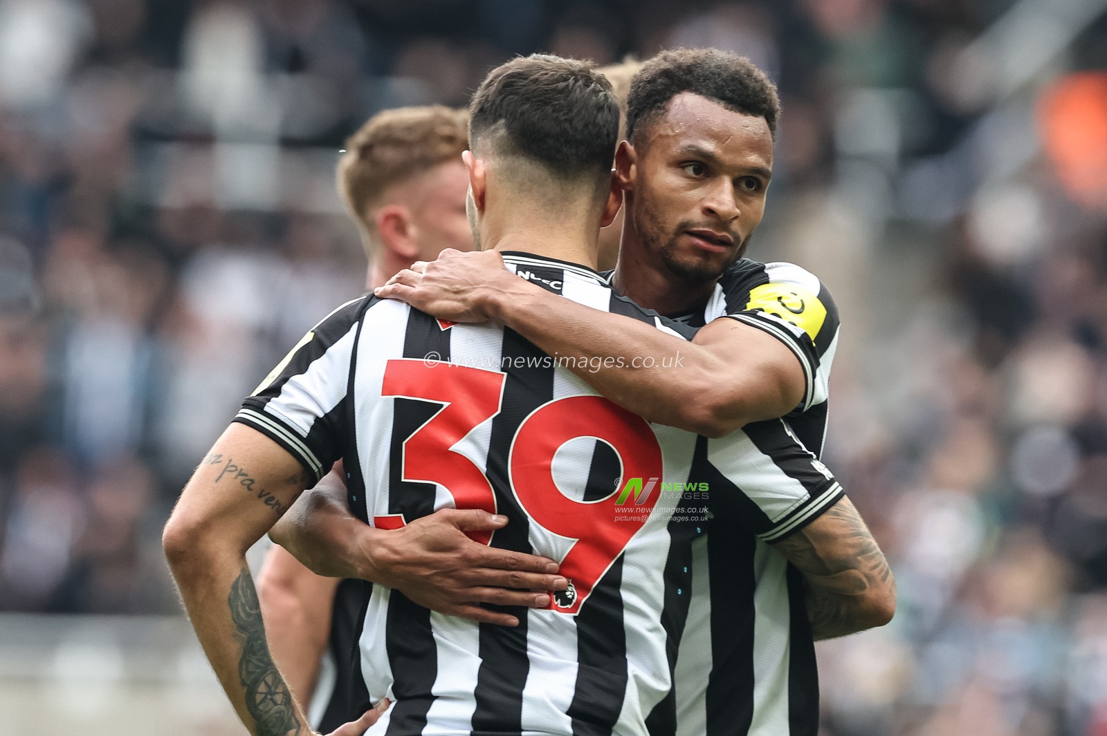 Jacob Murphy of Newcastle United embraces Bruno GuimarÃ£es of Newcastle United during the Premier League match Newcastle United vs West Ham United at St. James's Park, Newcastle, United Kingdom, 30th March 2024

(Photo by Mark Cosgrove/News Images)