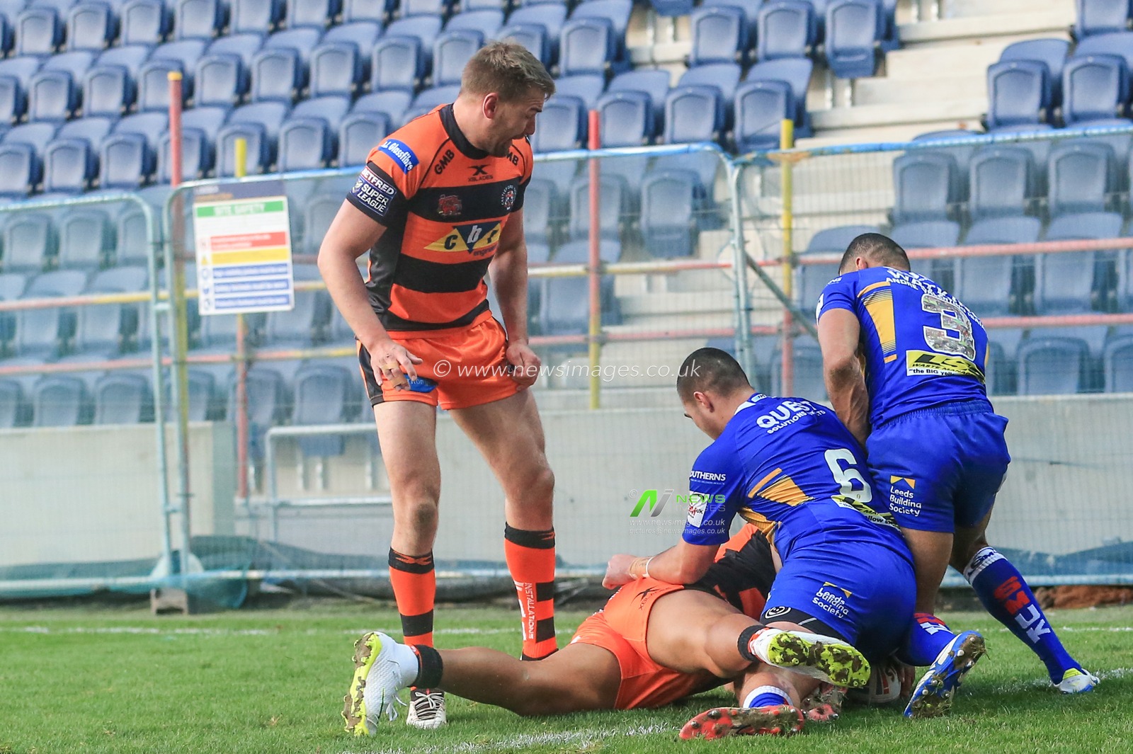 20th January 2019, Emerald Headingley Stadium, Leeds, England; Betfred Super League warm up and Kallum Watkins testimonial, Leeds Rhinos vs Castleford Tigers ; Junior Moors (16) of Castleford Tigers  goes over for a try

Credit: Mark Cosgrove/News Images