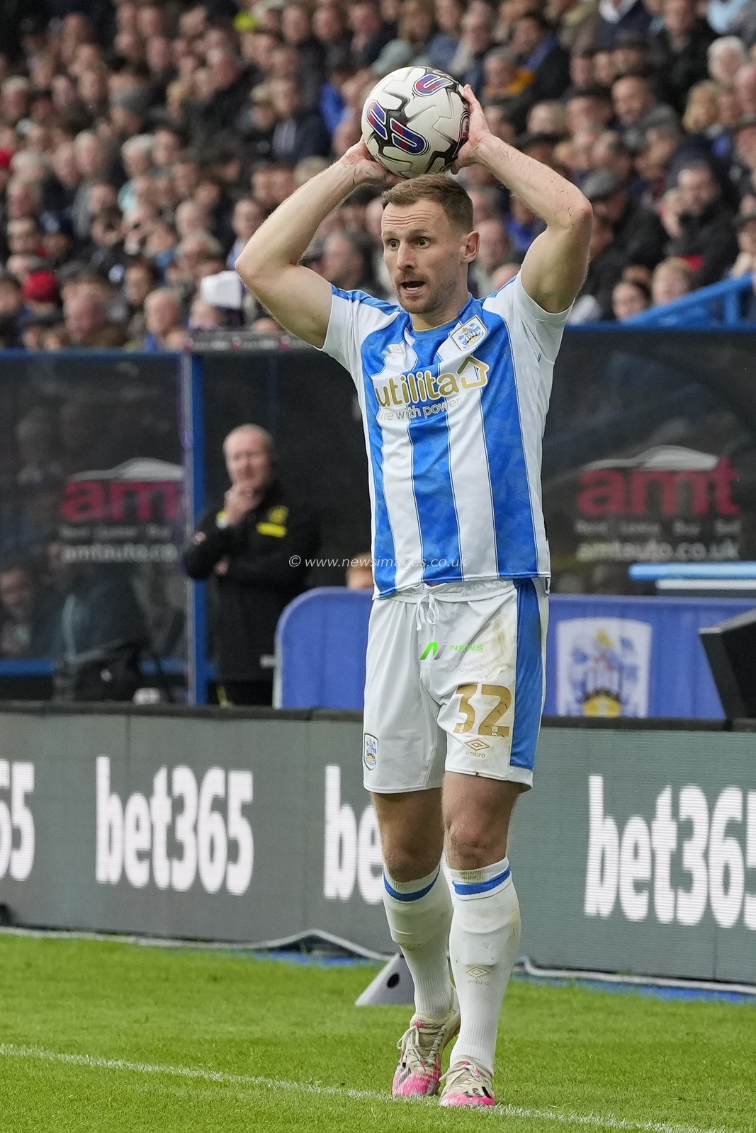 Tom Lees #32 of Huddersfield Town takes a throw in during the Sky Bet Championship match Huddersfield Town vs Queens Park Rangers at John Smith's Stadium, Huddersfield, United Kingdom, 21st October 2023

(Photo by Steve Flynn/News Images)