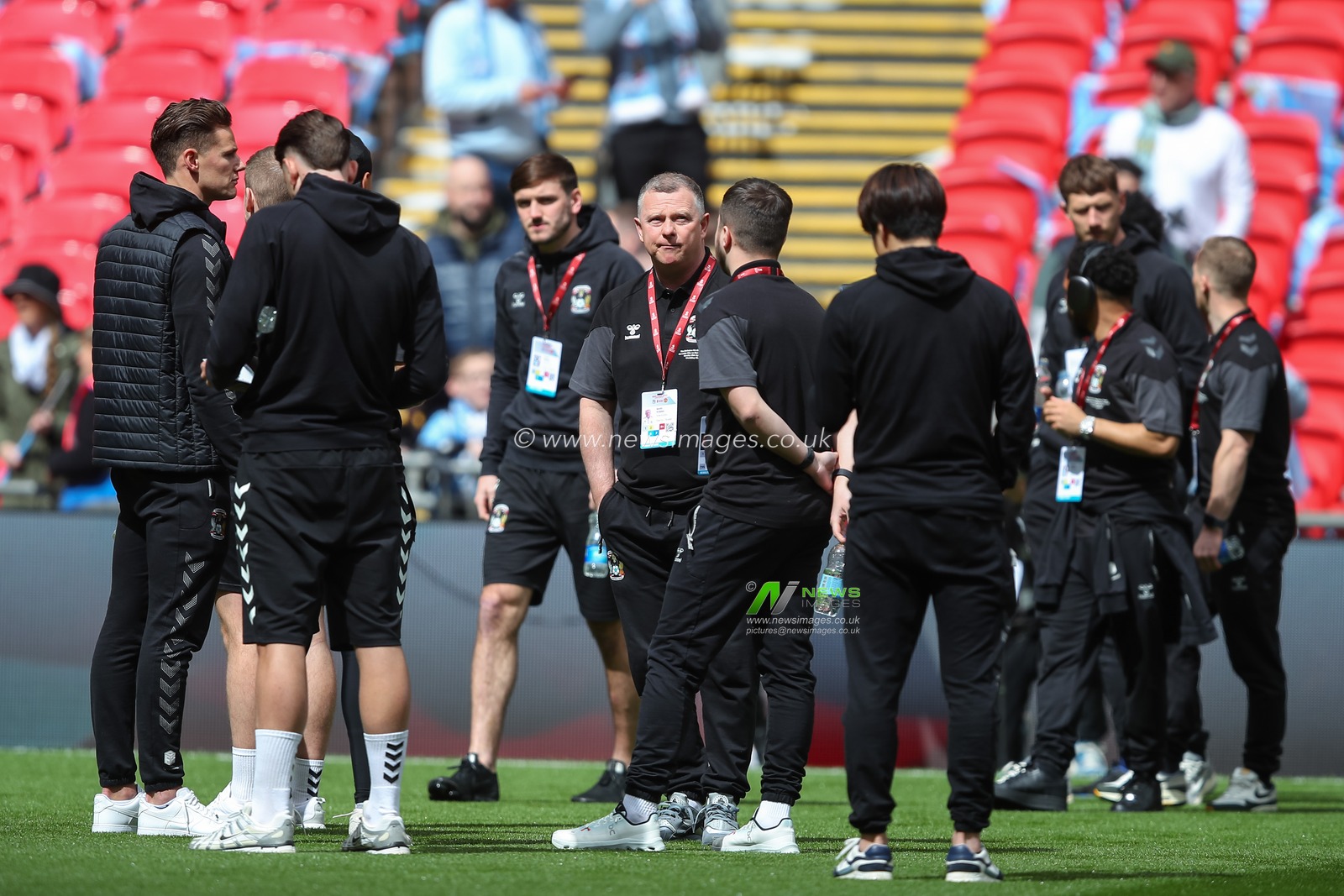 Mark Robins manager of Coventry City inspects the pitch with his squad ahead of the match, during the Emirates FA Cup Semi-Final match Coventry City vs Manchester United at Wembley Stadium, London, United Kingdom, 21st April 2024

(Photo by Gareth Evans/News Images)