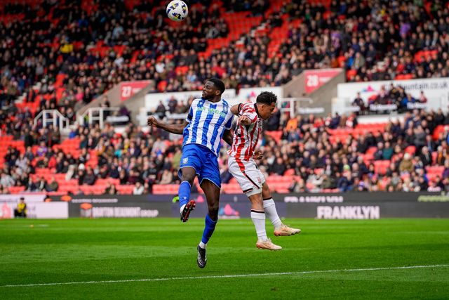 Dominic Iorfa of Sheffield Wednesday heads the ball away under pressure from ,Million Manhoef during the Sky Bet Championship match Stoke City vs Sheffield Wednesday at Bet365 Stadium, Stoke On Trent, United Kingdom on 03 April 2026

(Photo by Maynard Manyowa/News Images)
