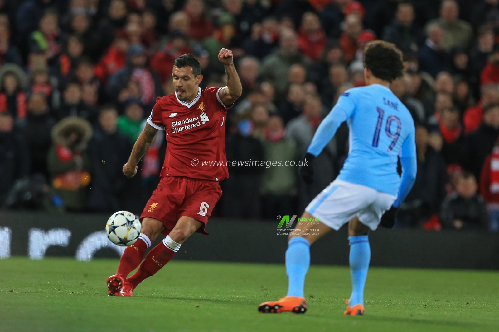 4th April 2018 , Anfield, Liverpool, England; Champions League Quarter Final, first leg, Liverpool v Manchester City; Dejan Lovren of Liverpool passes the ball