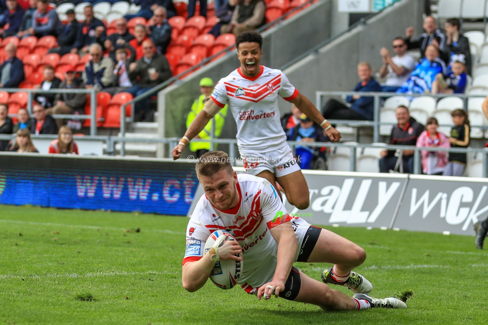 28th April 2019 , Totally Wicked Stadium, St Helens, England;  Betfred Super League, Round 13, St Helens vs Catalans Dragons ; Matthew Costello (24) of St Helens goes over for a hat-trick of tries 

Credit: Mark Cosgrove/News Images