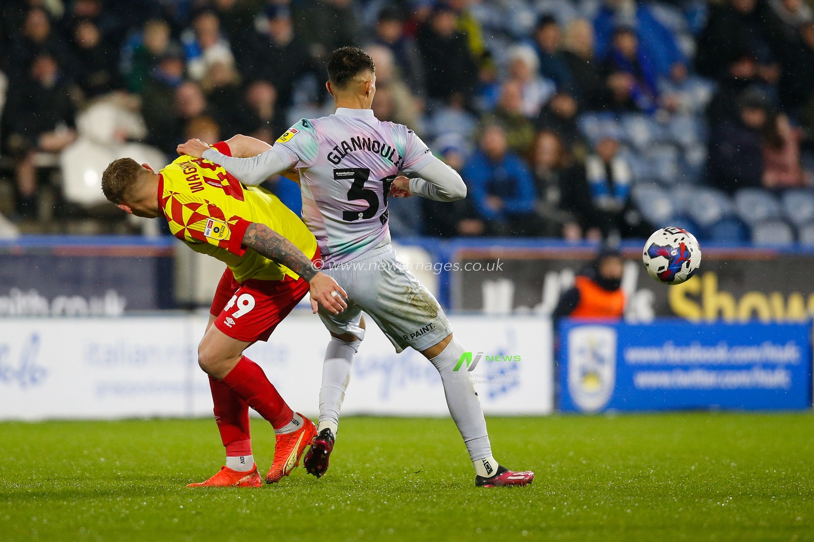 Martyn Waghorn #49 of Huddersfield Town and Dimitris Giannoulis #30 of Norwich City during the Sky Bet Championship match Huddersfield Town vs Norwich City at John Smith's Stadium, Huddersfield, United Kingdom, 15th March 2023

(Photo by Ben Early/News Images)