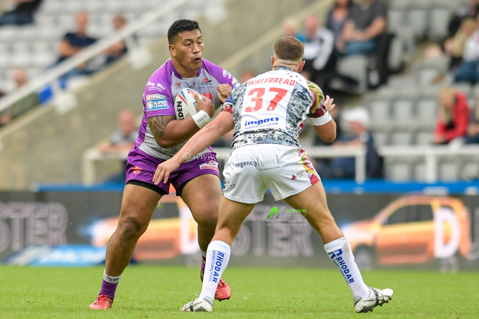 Albert Vete (8) of Hull KR looks for a way past Jai Whitbread (37) of Leigh Centurions