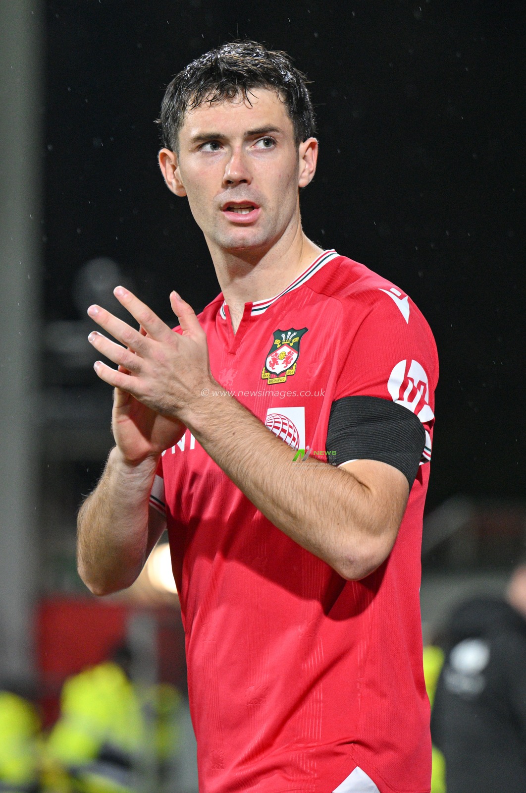 Thomas O'Connor 22# of Wrexham Association Football Club walks out ahead of kick off, during the Sky Bet League 2 match Wrexham vs Sutton United at SToK Cae Ras, Wrexham, United Kingdom, 24th October 2023

(Photo by Cody Froggatt/News Images)