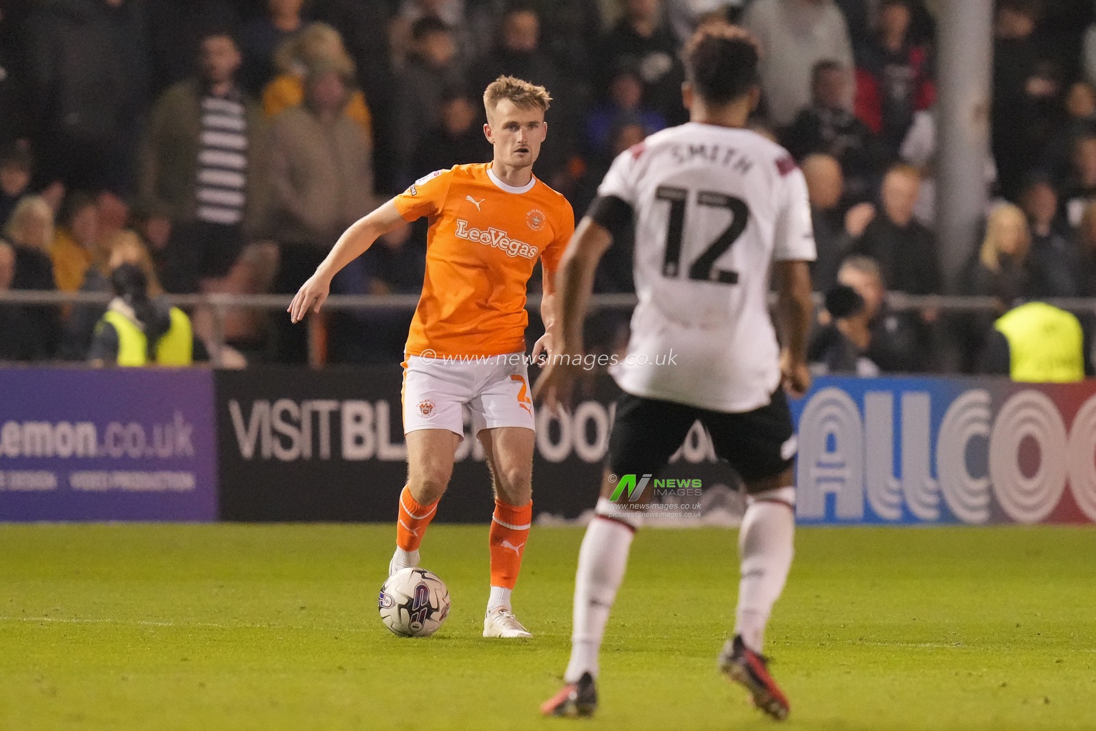 Callum Connolly #2 of Blackpool runs at Korey Smith #12 of Derby County during the Sky Bet League 1 match Blackpool vs Derby County at Bloomfield Road, Blackpool, United Kingdom, 3rd October 2023

(Photo by Steve Flynn/News Images)