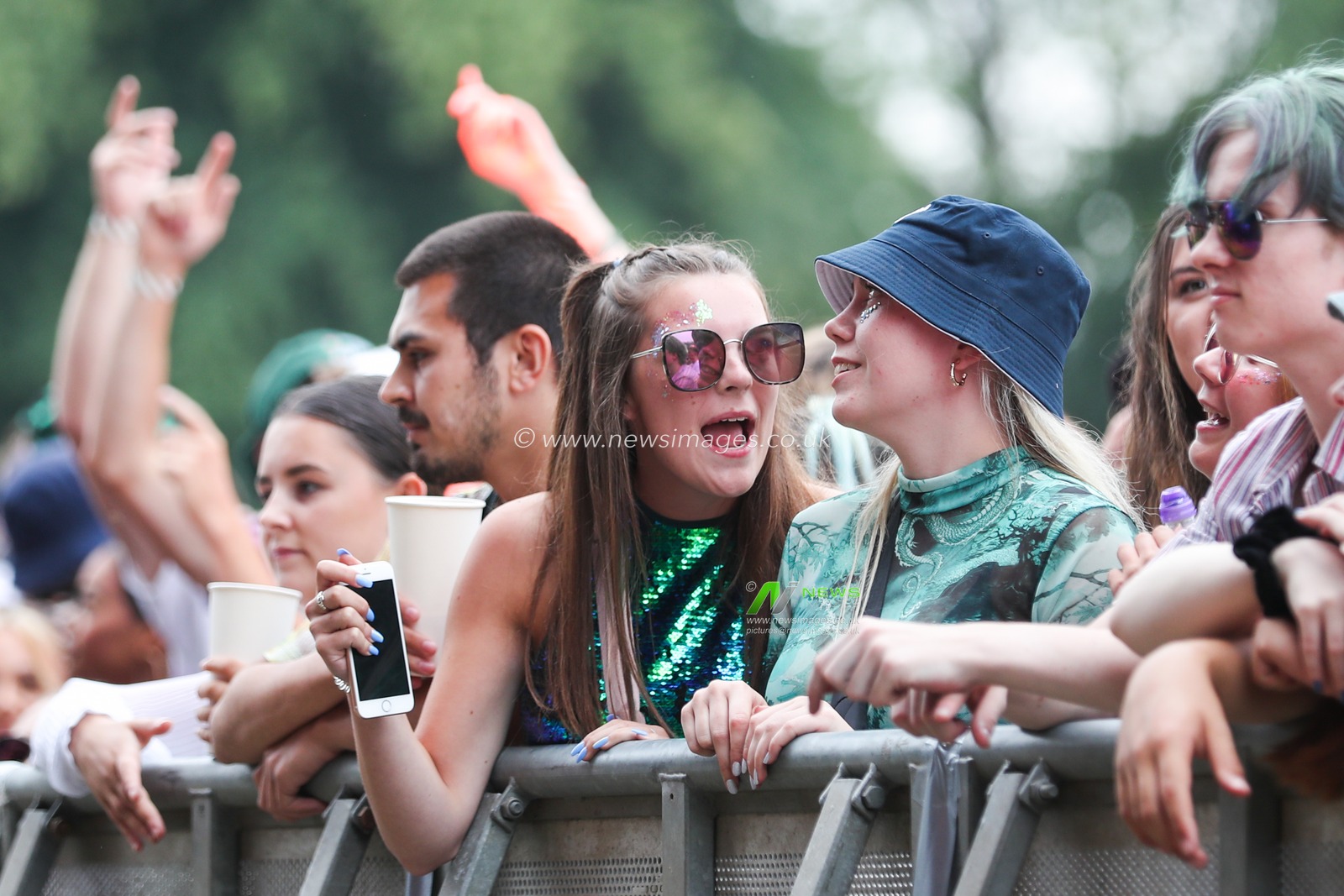 Festival goers enjoy the music during Day One of Tramlines Festival