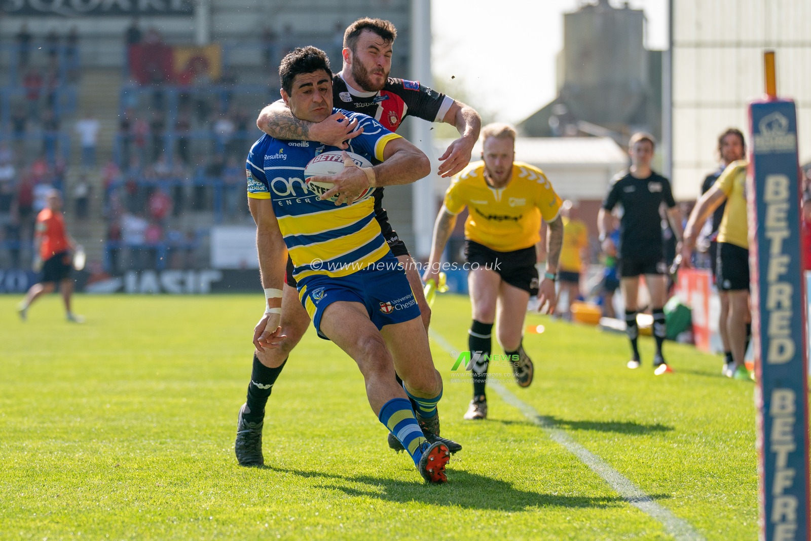 Warrington Wolves's Bryson Goodwin is tackled by Salford Red Devils's Jake Bibby

19th April 2019 , Halliwell Jones Stadium, Warrington, England;  Betfred Super League, Round 11, Warrington Wolves vs Salford Red Devils ; 

Credit: Terry Donnelly/News Images