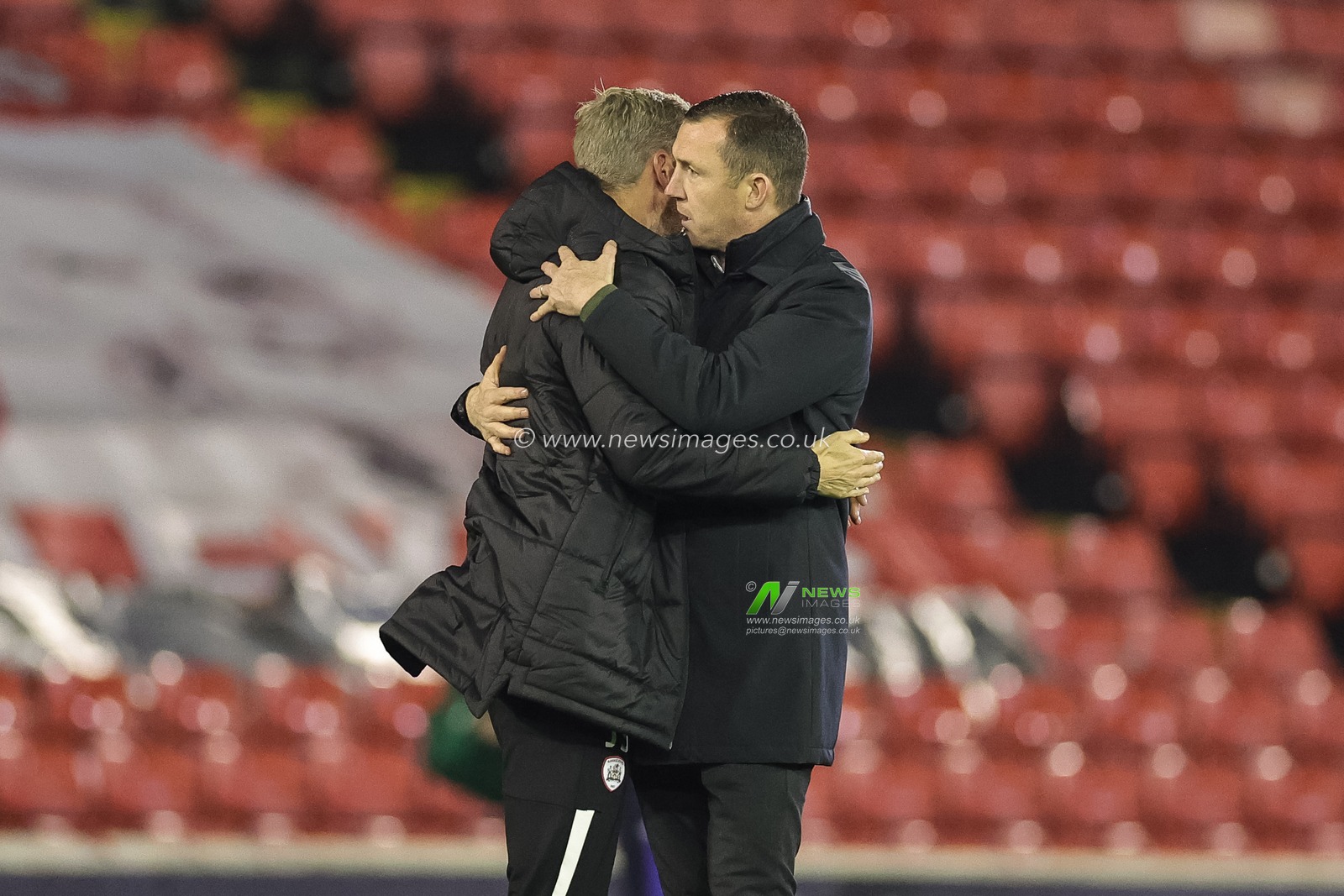Jon Stead first team coach of Barnsley embraces Neill Collins Head coach of Barnsley during the Sky Bet League 1 match Barnsley vs Shrewsbury Town at Oakwell, Barnsley, United Kingdom, 24th October 2023

(Photo by Mark Cosgrove/News Images)