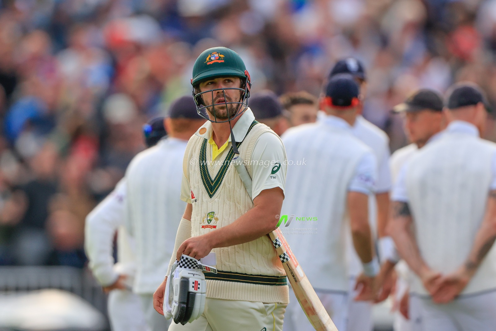 A dejected Travis Head of Australia leaves the field after being dismissed by Mark Wood of England during the LV= Insurance Ashes Fourth Test Series Day Three Test Series match England vs Australia at Old Trafford, Manchester, United Kingdom, 21st July 2023

(Photo by Conor Molloy/News Images)