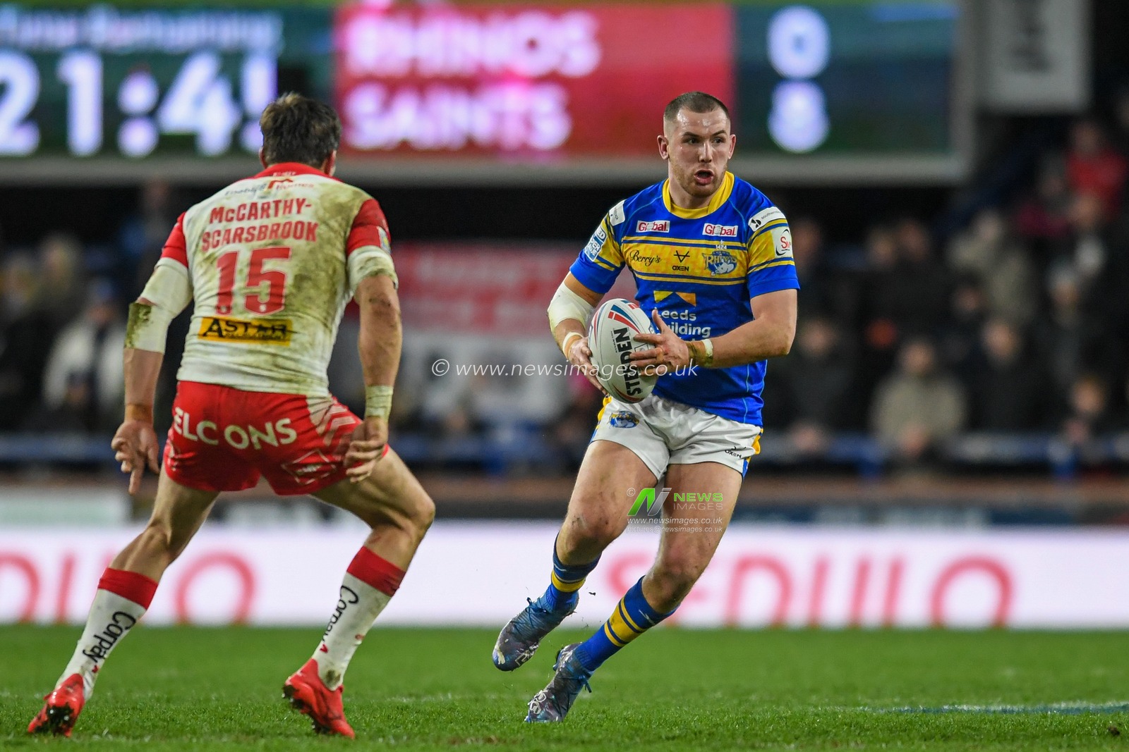 Cameron Smith #17 of Leeds Rhinos runs forward with the ball