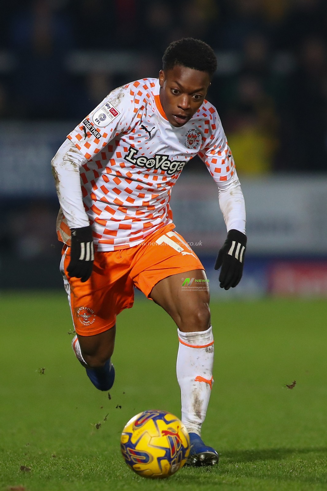Karamoko DembÃ©lÃ© #11 of Blackpool breaks with the ball during the Sky Bet League 1 match Burton Albion vs Blackpool at Pirelli Stadium, Burton upon Trent, United Kingdom, 26th December 2023

(Photo by Gareth Evans/News Images)