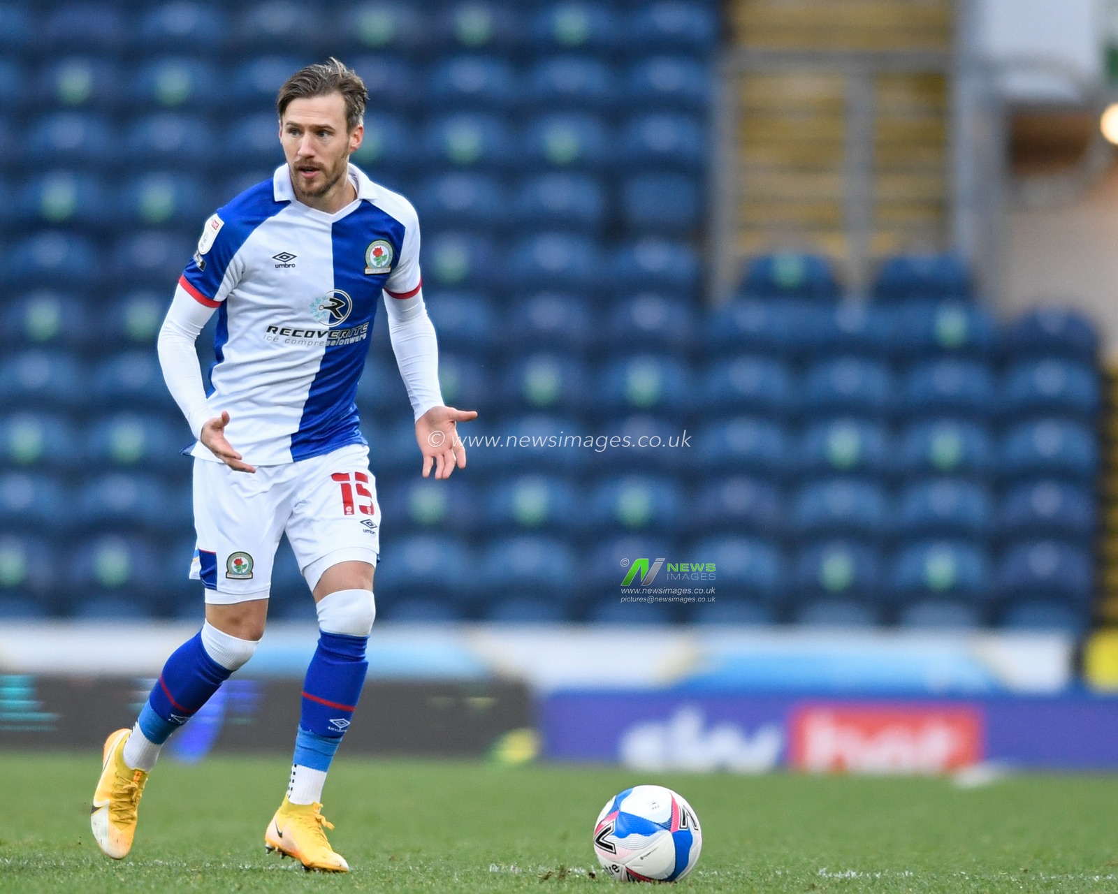 Barry Douglas #15 of Blackburn Rovers looks for a passing option