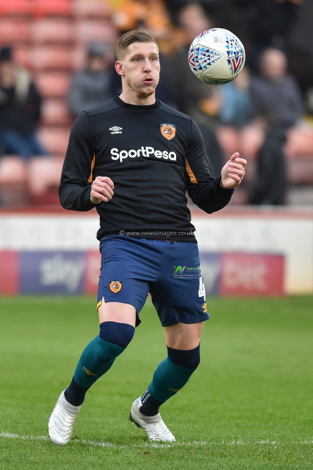 30th November 2019, Oakwell, Barnsley, England; Sky Bet Championship, Barnsley v Hull City : Jordy De Wijs (4) of Hull City 

Credit: Dean Williams/News Images