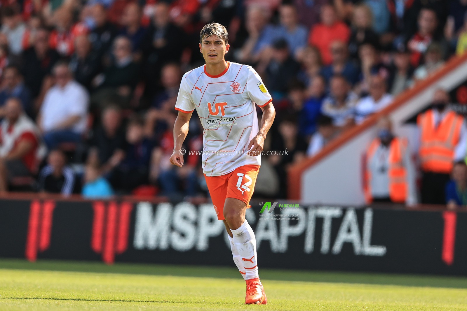 Kenny Dougall #12 of Blackpool in action during the game