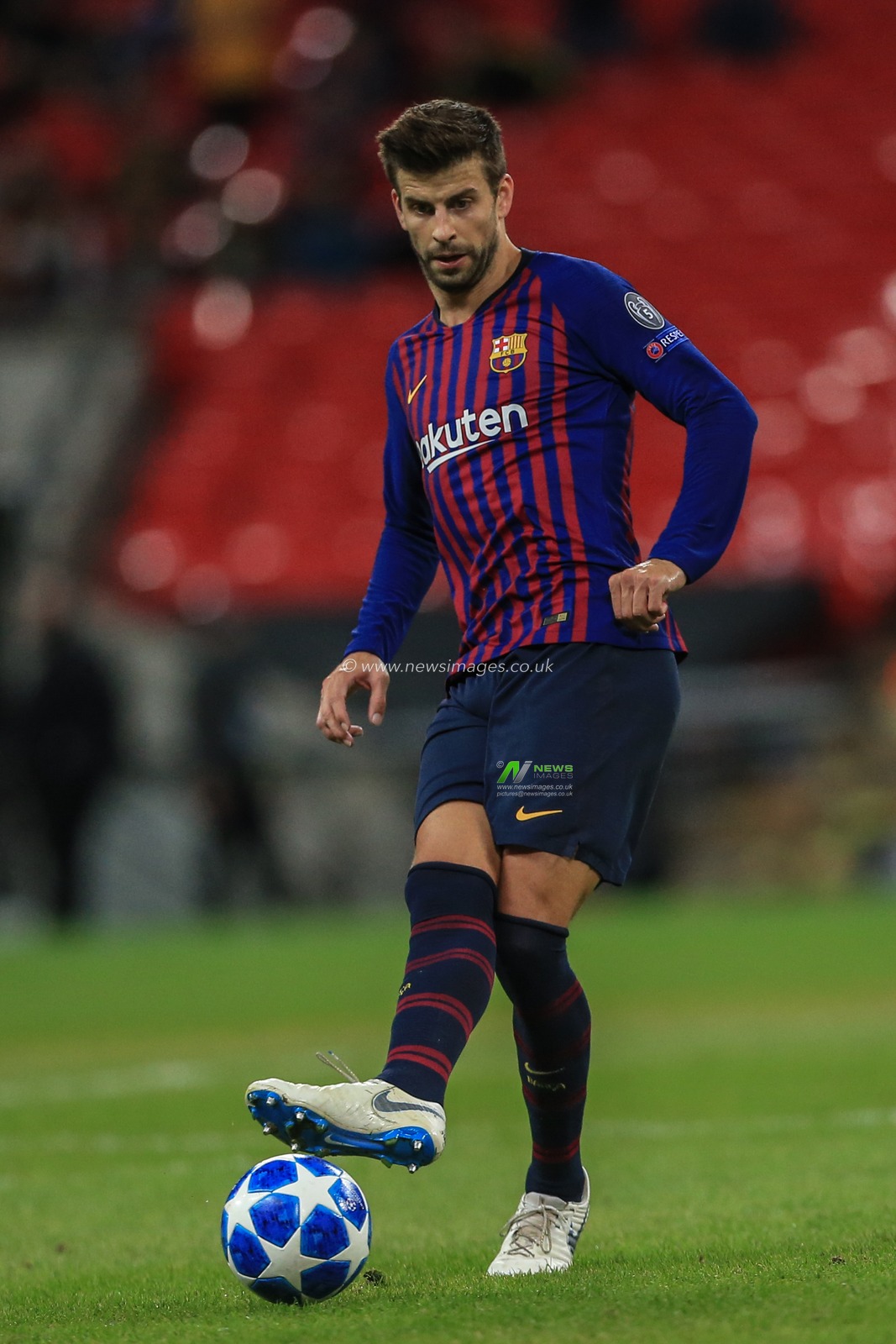 3rd October 2018, Wembley Stadium, London, England; UEFA Champions League, Tottenham v Barcelona ; Gerard Pique (03) of Barcelona passes the ball

Credit: Mark Cosgrove/News Images