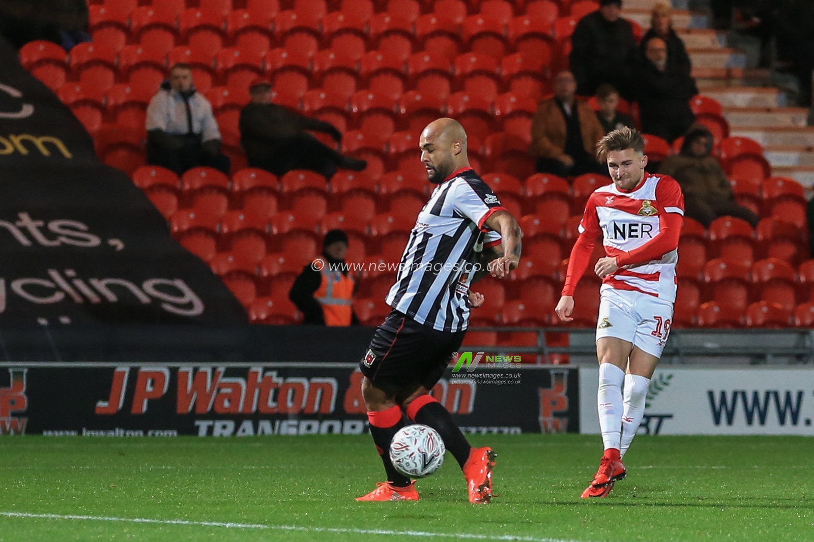 20th November 2018, Keepmoat Stadium, Doncaster, England; The Emirates FA Cup, Round 1, Doncaster Rovers v Chorley ; Alfie May (19) of Doncaster scores to make it  1-0

Credit: Mark Cosgrove/News Images

English Football League images are subject to DataCo Licence