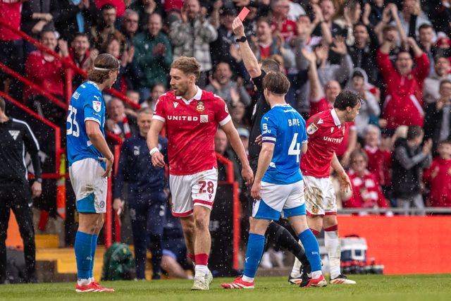 Stockport County's Brad Hills receives a red card during the Sky Bet League 1 match Wrexham vs Stockport County at SToK Cae Ras, Wrexham, United Kingdom, 22nd March 2025

(Photo by Nik Mesney/News Images)