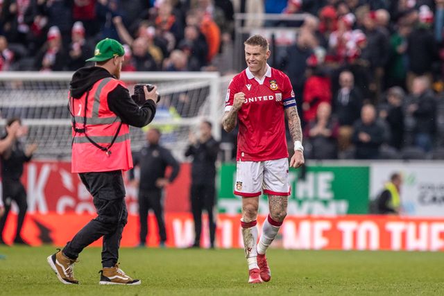 Wrexham's James McClean celebrates at full time during the Sky Bet League 1 match Wrexham vs Stockport County at SToK Cae Ras, Wrexham, United Kingdom, 22nd March 2025

(Photo by Nik Mesney/News Images)