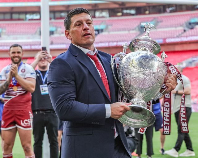 Matt Peet head coach of Wigan Warriors lifts the  Betfred Challenge Cup Trophy up to the fans as he celebrates the win during the Betfred Challenge Cup Final match Wigan Warriors vs Hull KR at Wembley Stadium, London, United Kingdom on 30 May 2026

(Photo by Mark Cosgrove/News Images)