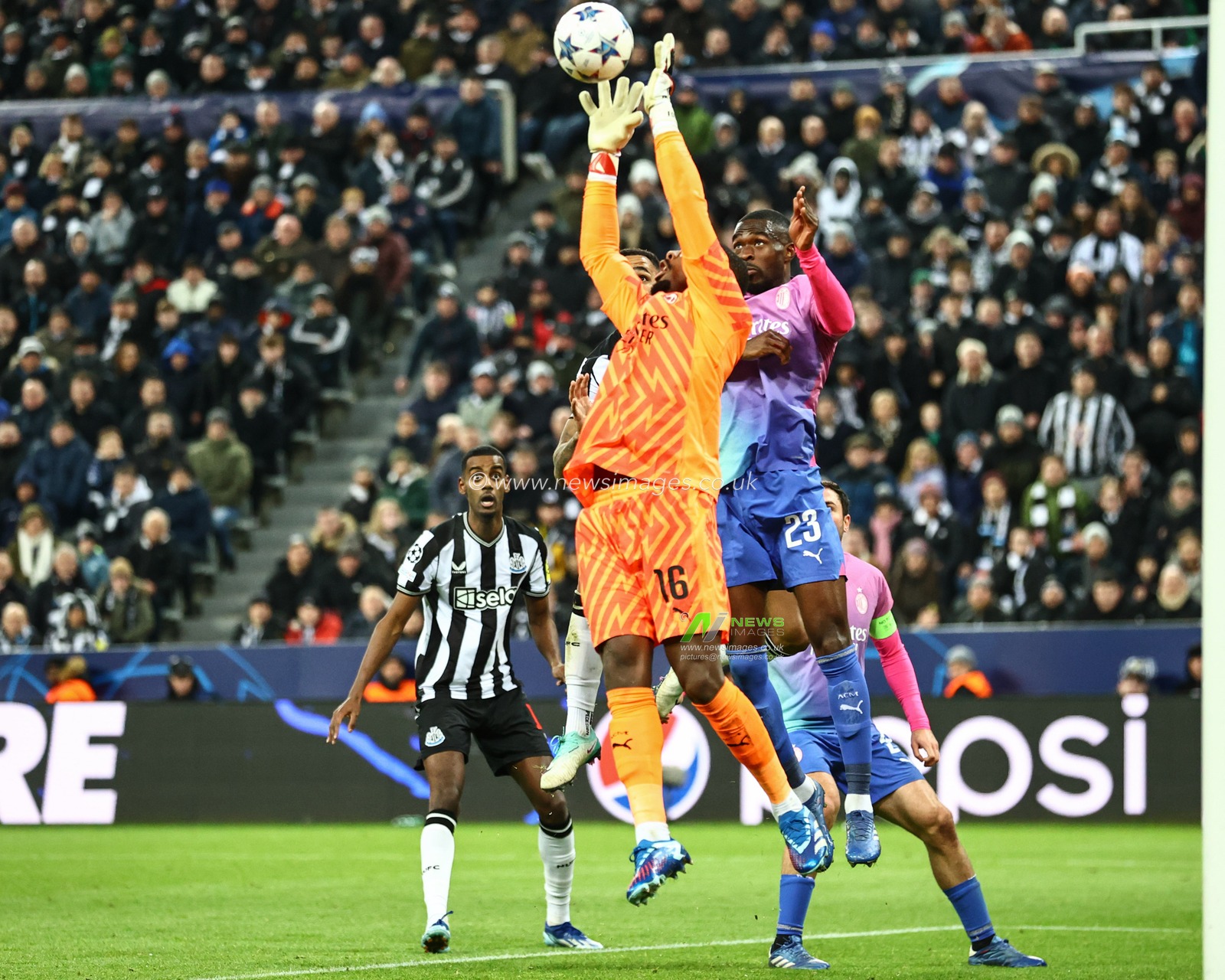 Mike Maignan #16 of AC Milan collects the ball during the UEFA Champions League match Newcastle United vs AC Milan at St. James's Park, Newcastle, United Kingdom, 13th December 2023

(Photo by Mark Cosgrove/News Images)