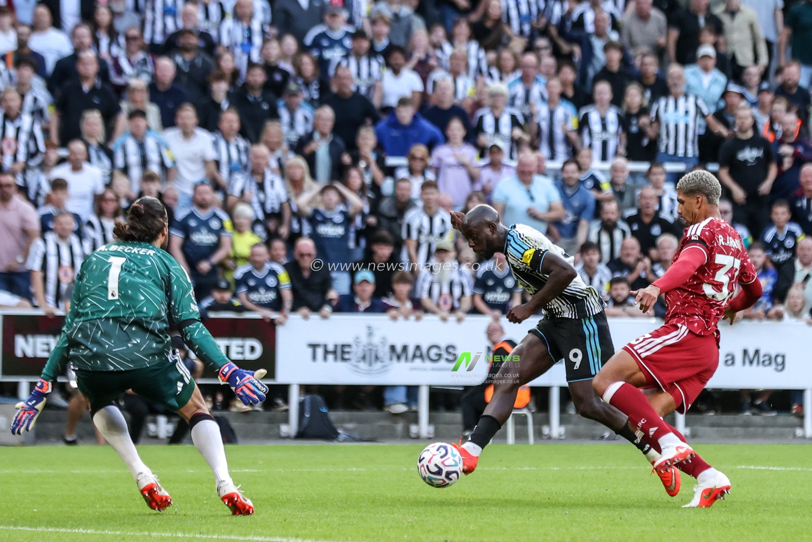 Liverpool goalkeeper Alisson Becker blocks a shot on goal from Yoane Wissa of Newcastle United during the Premier League match Newcastle Untied vs Liverpool at St. James's Park, Newcastle, United Kingdom on 23 August 2026

(Photo by Alfie Cosgrove/News Images)