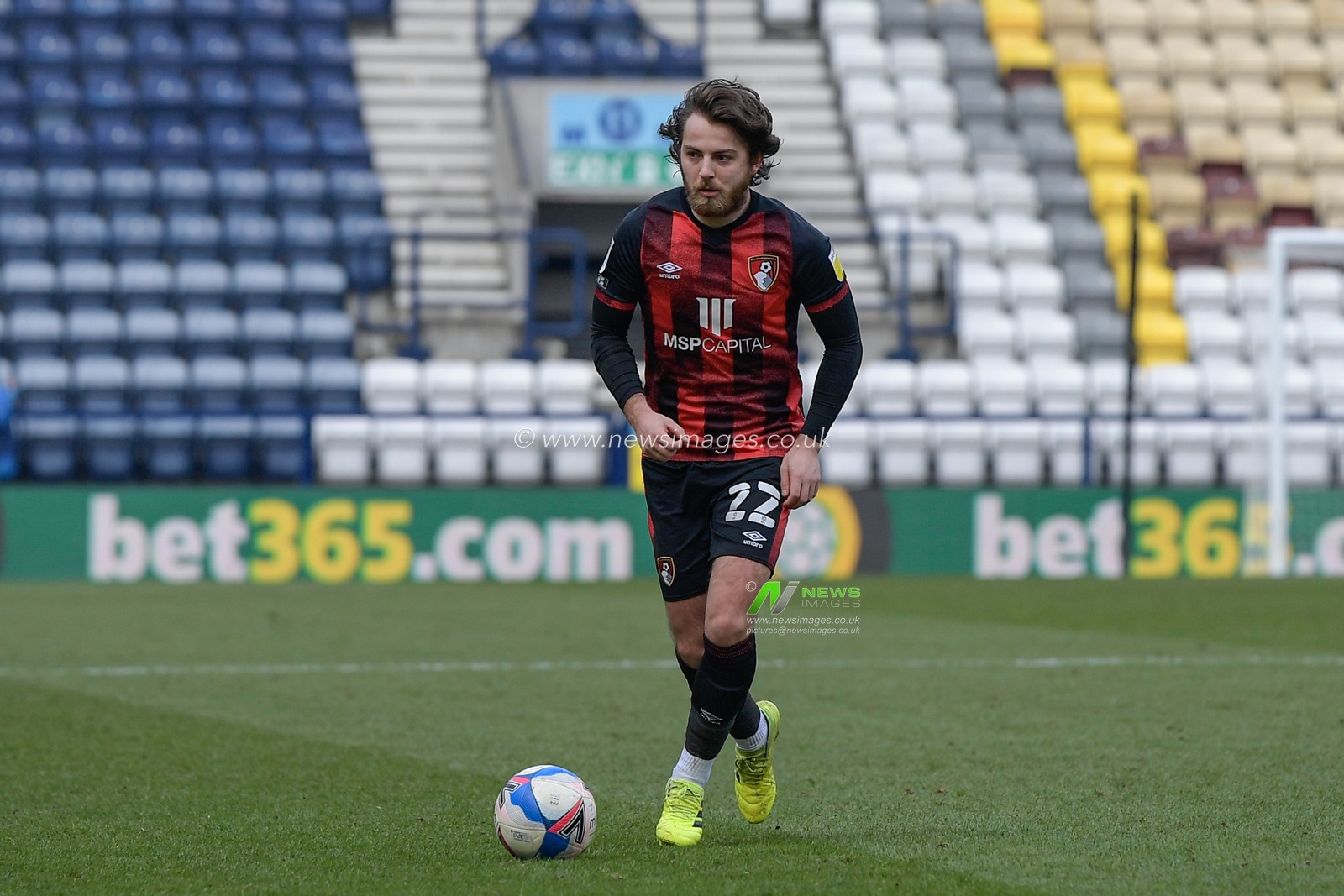 Ben Pearson #22 of Bournemouth runs with the ball