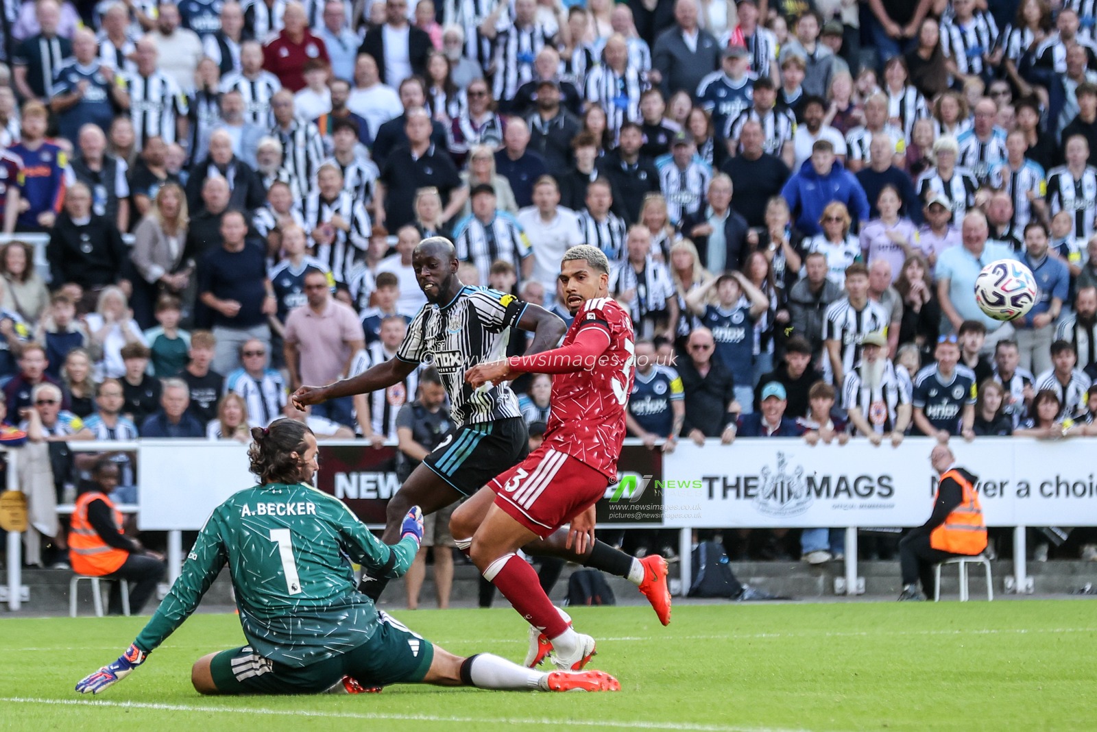 Liverpool goalkeeper Alisson Becker blocks a shot on goal from Yoane Wissa of Newcastle United during the Premier League match Newcastle Untied vs Liverpool at St. James's Park, Newcastle, United Kingdom on 23 August 2026

(Photo by Alfie Cosgrove/News Images)