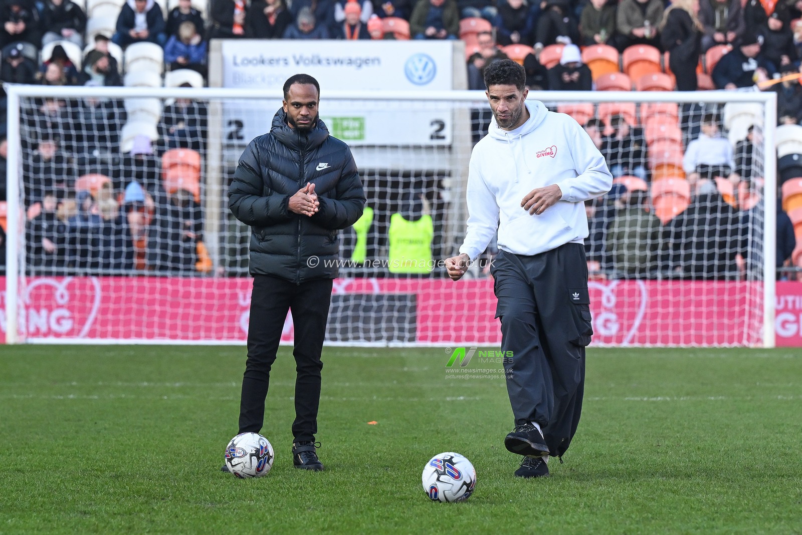 Former England and Portsmouth Goal Keeper David James  and former Blackpool player Nathan Delfouneso during the Sky Bet League 1 match Blackpool vs Portsmouth at Bloomfield Road, Blackpool, United Kingdom, 9th March 2024

(Photo by Craig Thomas/News Images)