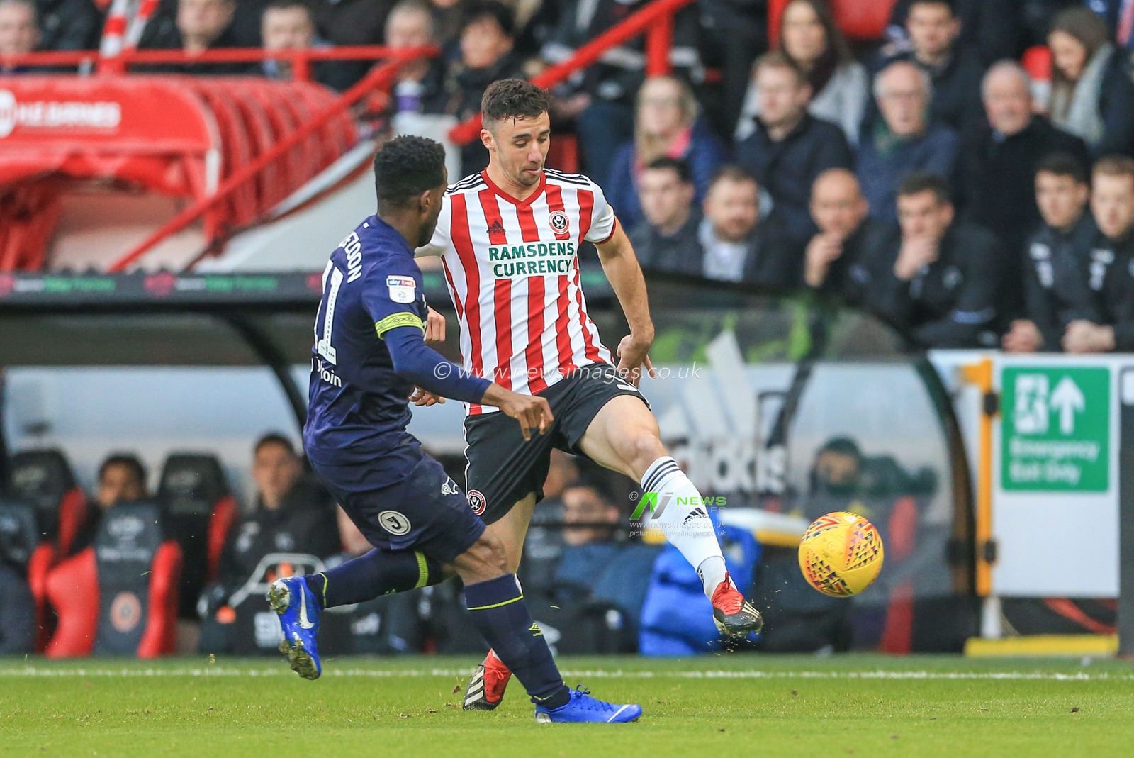 26th December 2018, Bramall Lane, Sheffield, England; Sky Bet Championship, Sheffield United vs Derby ; Enda Stevens (03) of Sheffield United passes the ball as Florian Jozefzoon (11) of Derby County pressures 


Credit: Mark Cosgrove/News Images

English Football League images are subject to DataCo Licence