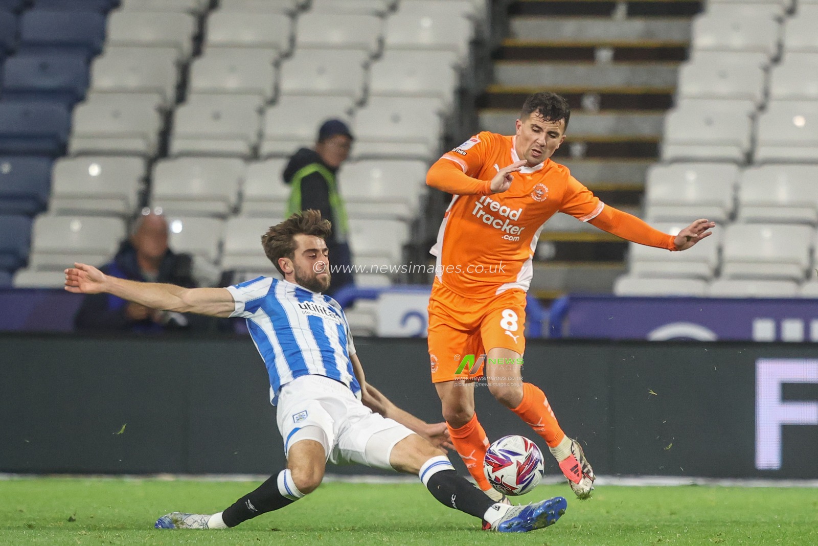Albie Morgan of Blackpool is fouled by Antony Evans of Huddersfield Town during the Sky Bet League 1 match Huddersfield Town vs Blackpool at John Smith's Stadium, Huddersfield, United Kingdom, 24th September 2024

(Photo by Alfie Cosgrove/News Images)