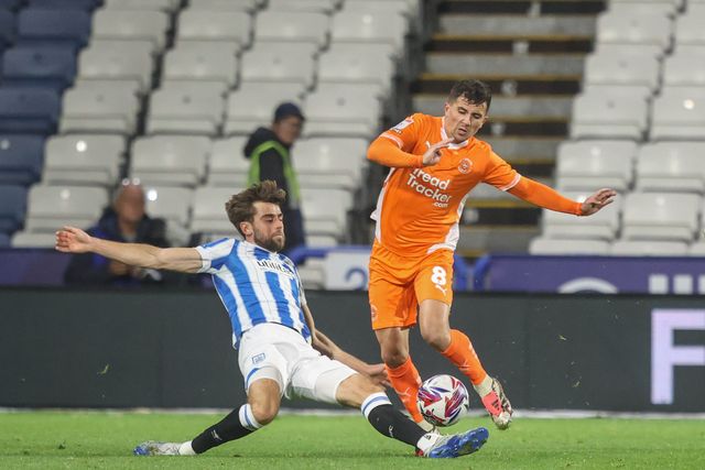Albie Morgan of Blackpool is fouled by Antony Evans of Huddersfield Town during the Sky Bet League 1 match Huddersfield Town vs Blackpool at John Smith's Stadium, Huddersfield, United Kingdom, 24th September 2024

(Photo by Alfie Cosgrove/News Images)