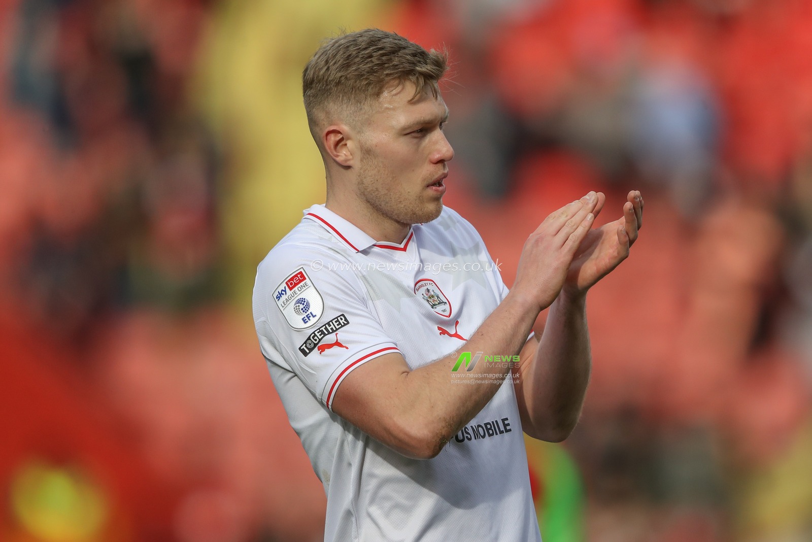 Sam Cosgrove of Barnsley applauds the travelling fans after the game during the Sky Bet League 1 match Charlton Athletic vs Barnsley at The Valley, London, United Kingdom, 6th April 2024

(Photo by Alfie Cosgrove/News Images)