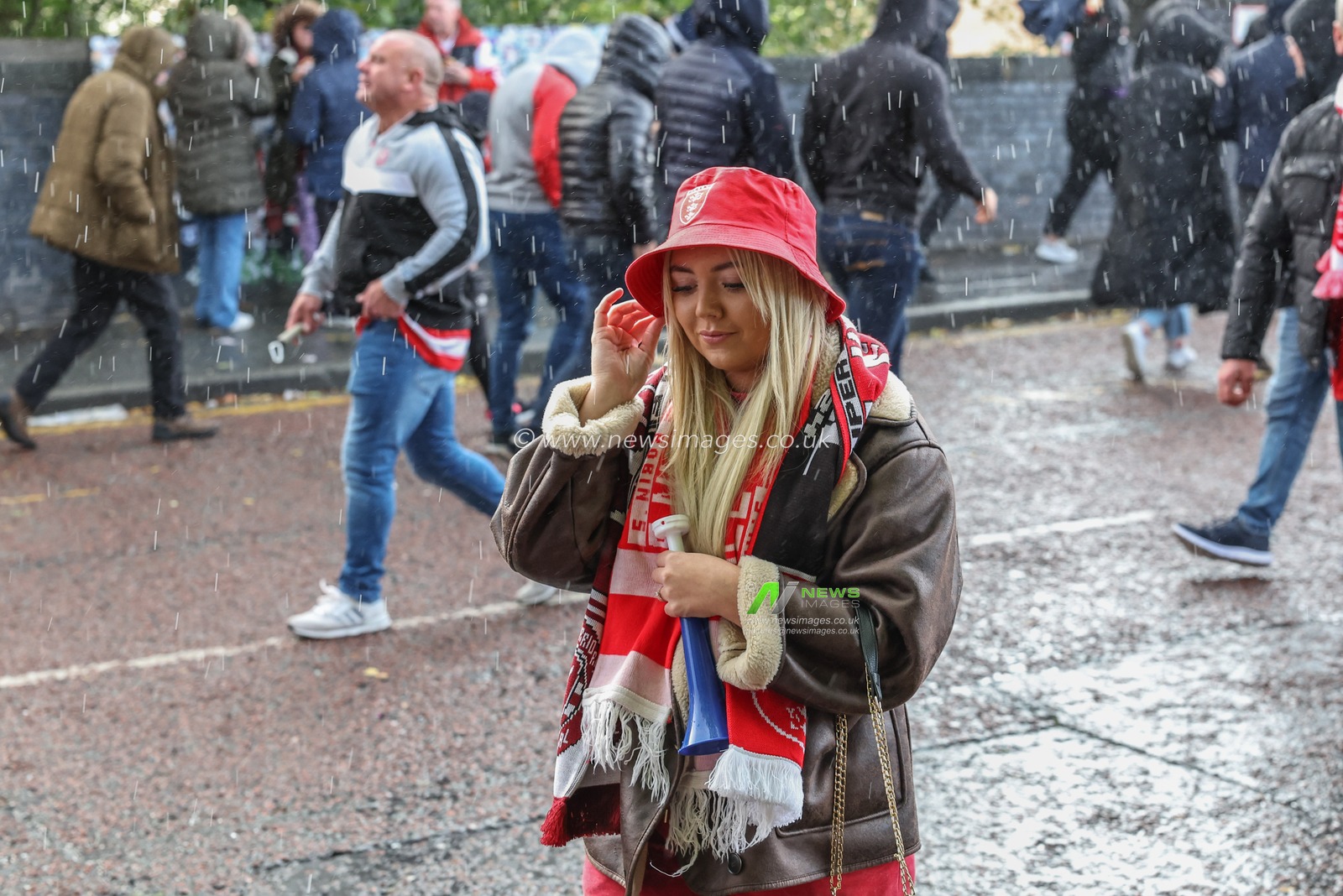 Fans make their way to Old Trafford during the Betfred Super League Grand Final match Wigan Warriors vs Hull KR at Old Trafford, Manchester, United Kingdom, 12th October 2024

(Photo by Mark Cosgrove/News Images)